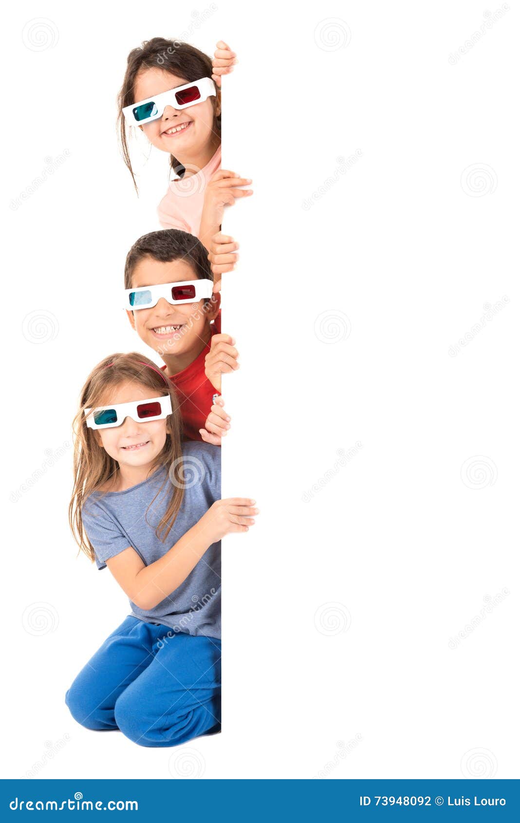 Kids in the movies. Group of children with 3d glasses over a white board