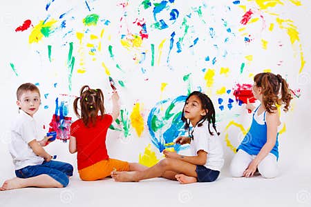 Kids painting the wall stock photo. Image of cute, happiness - 19523330