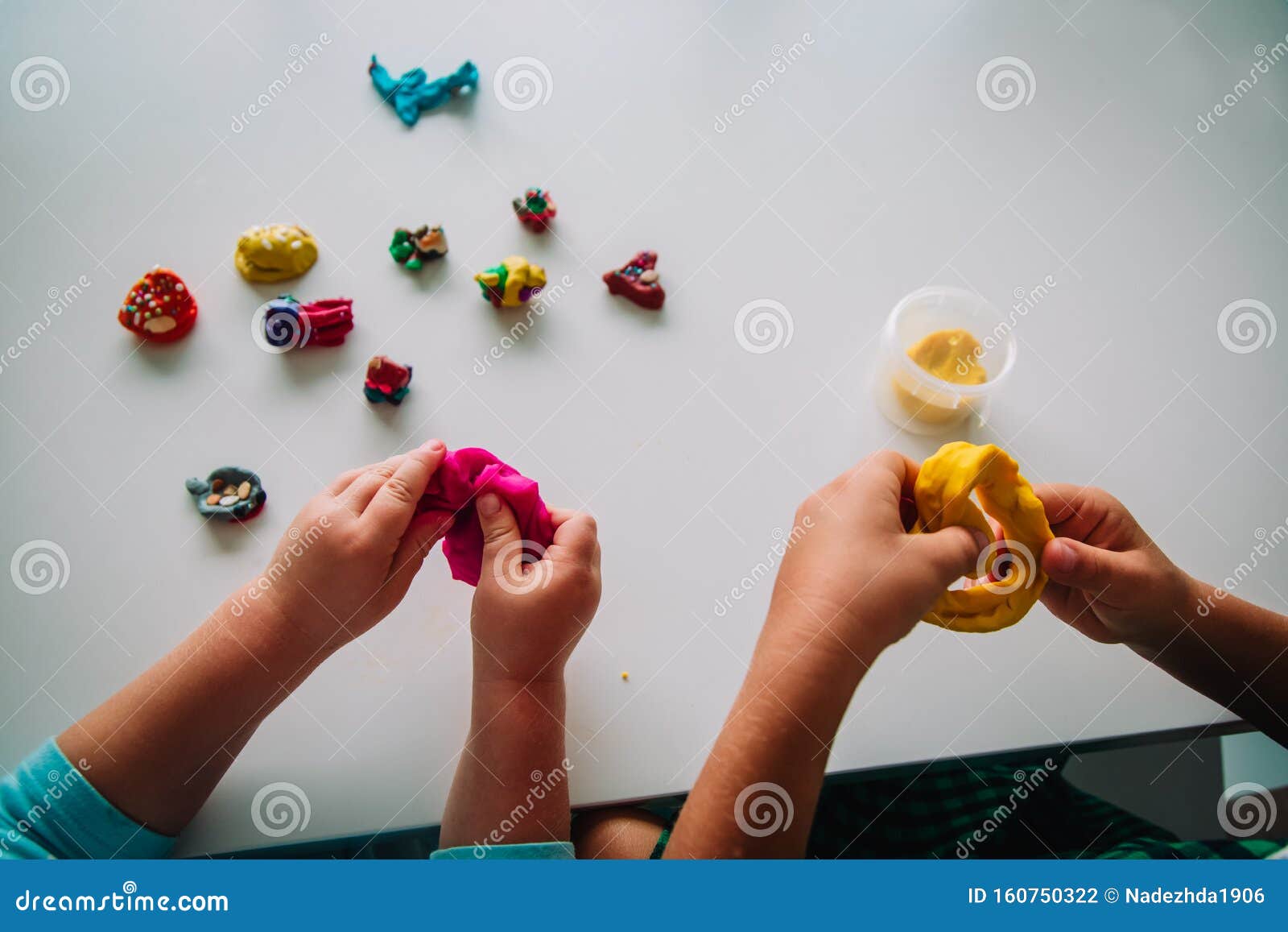 Kids Play with Clay Molding Shapes, Learning through Play Stock Photo