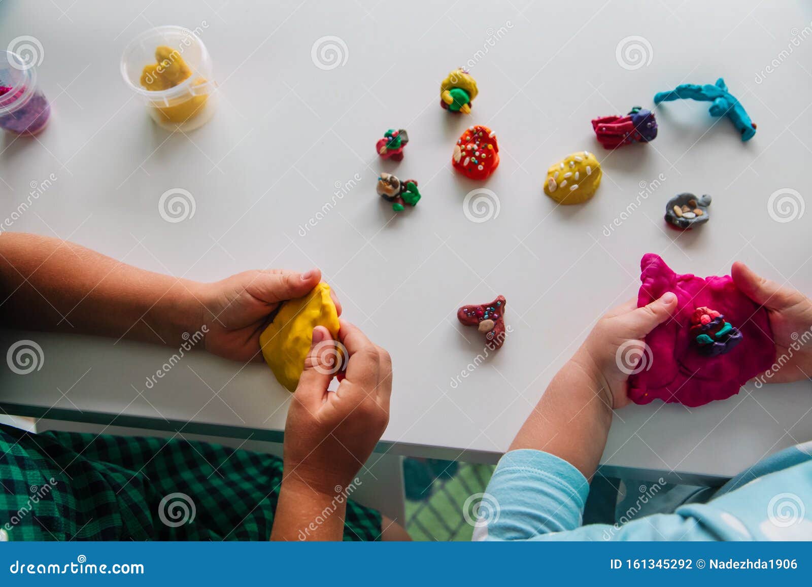Kids Play with Clay Molding Shapes, Learning through Play Stock Photo