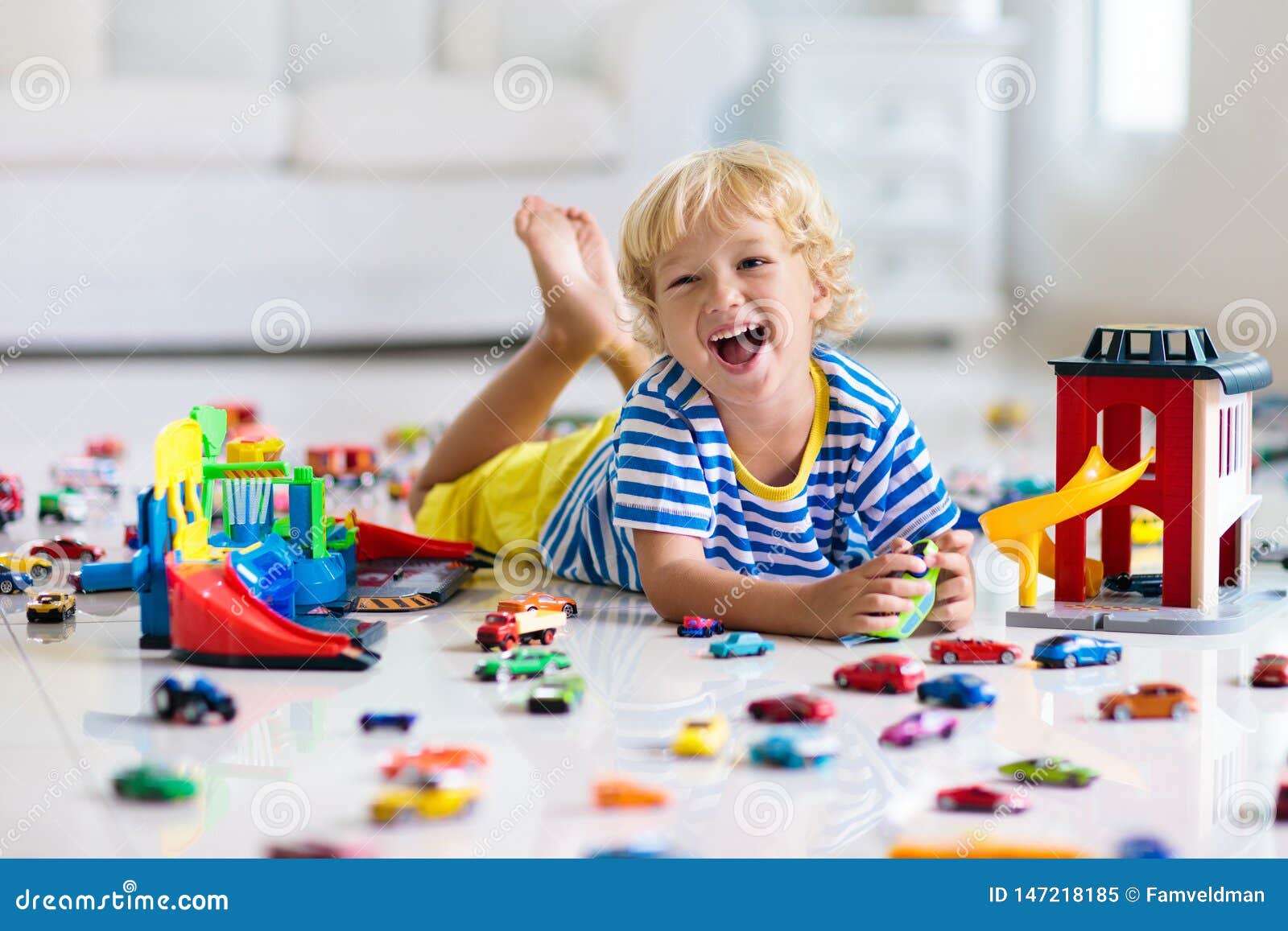 kids playing with toy trucks