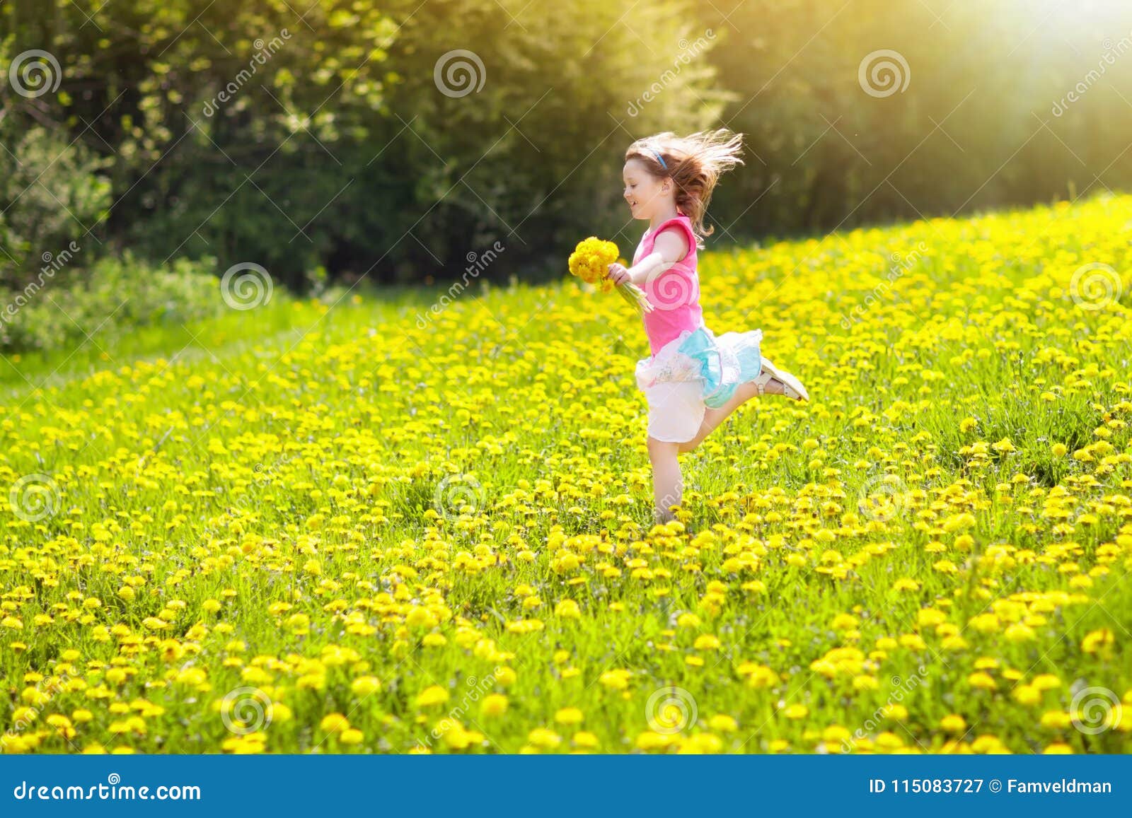 Kids play. Child in dandelion field. Summer flower. Kids play in yellow dandelion field. Child picking summer flowers. Little girl running in spring dandelions meadow. Children play outdoor. Kid in blooming park. Nature and outdoors fun for family.