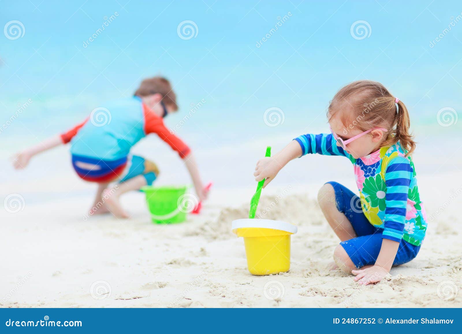 Kids playing at beach stock photo. Image of coastline - 24867252