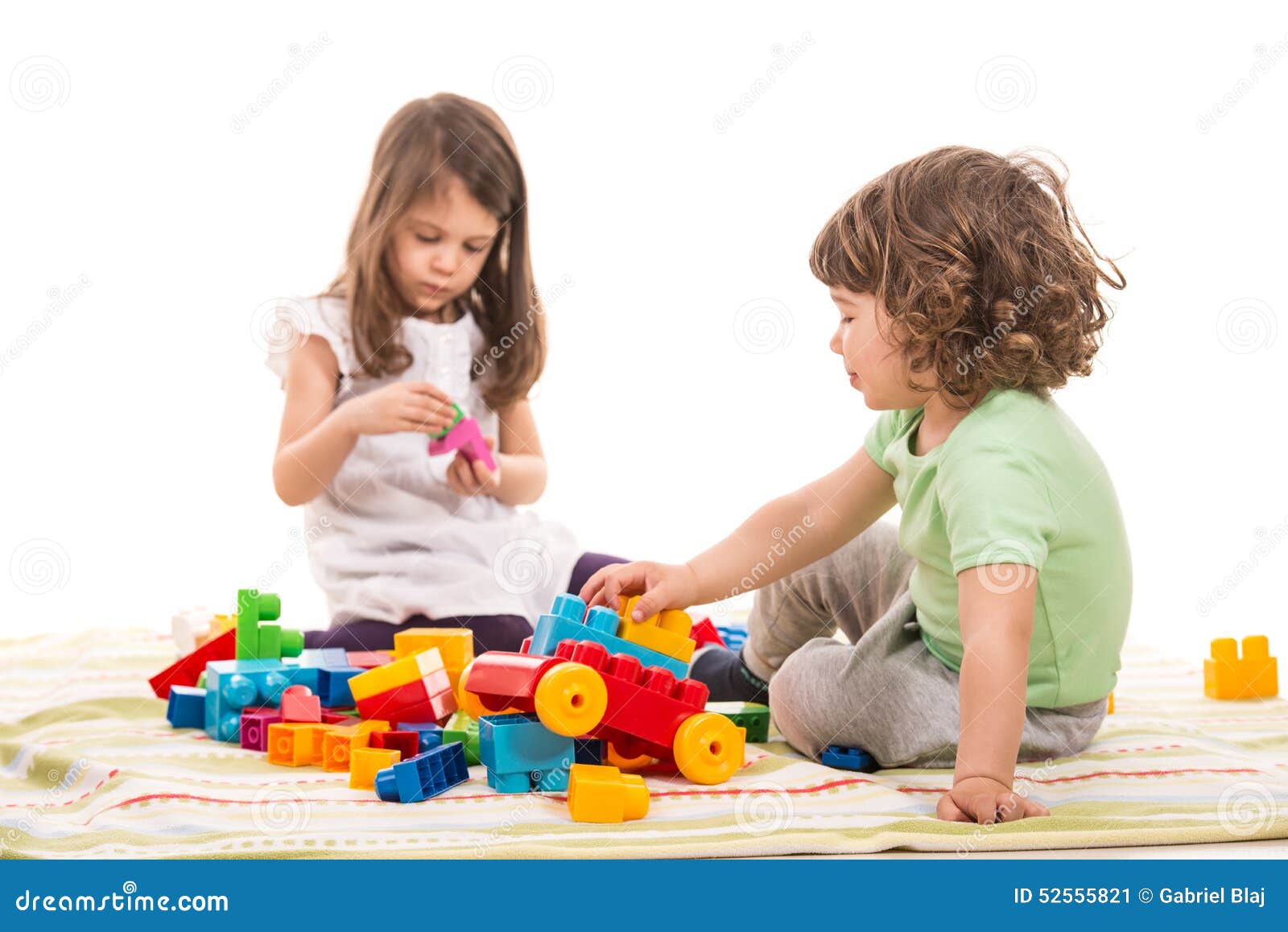 kids playing with bricks toys
