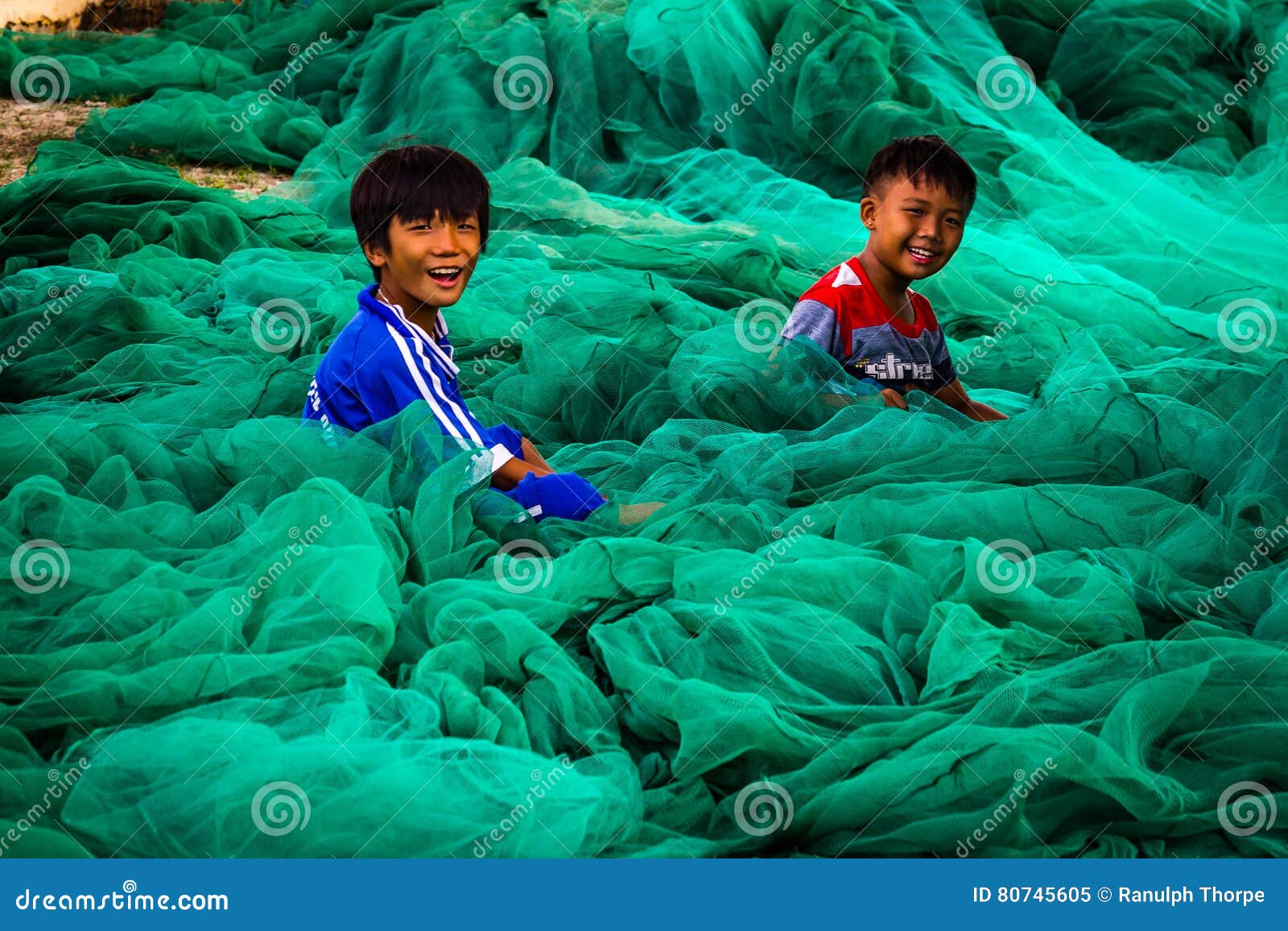 Kids Playing in Fishing Nets Editorial Image - Image of harbour, fishing:  80745605