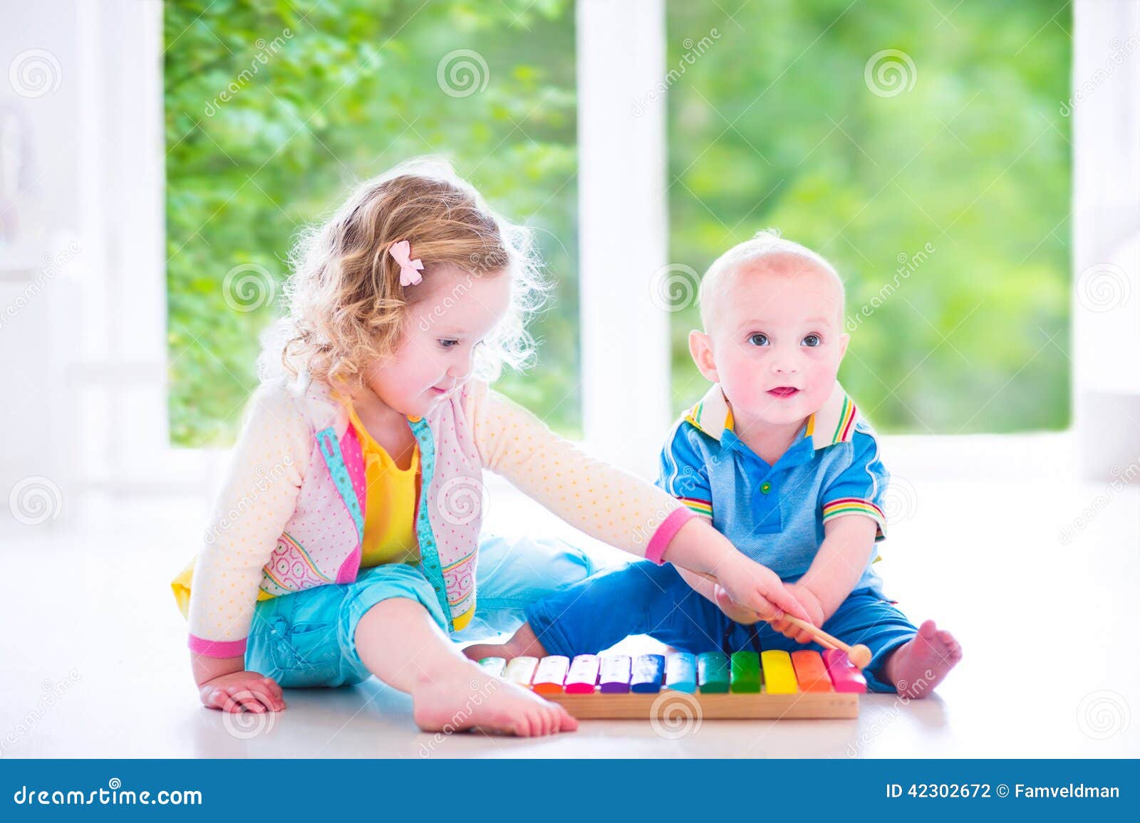 kids playing music with xylophone