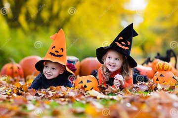Kids with Pumpkins on Halloween Stock Image - Image of dressed, group ...
