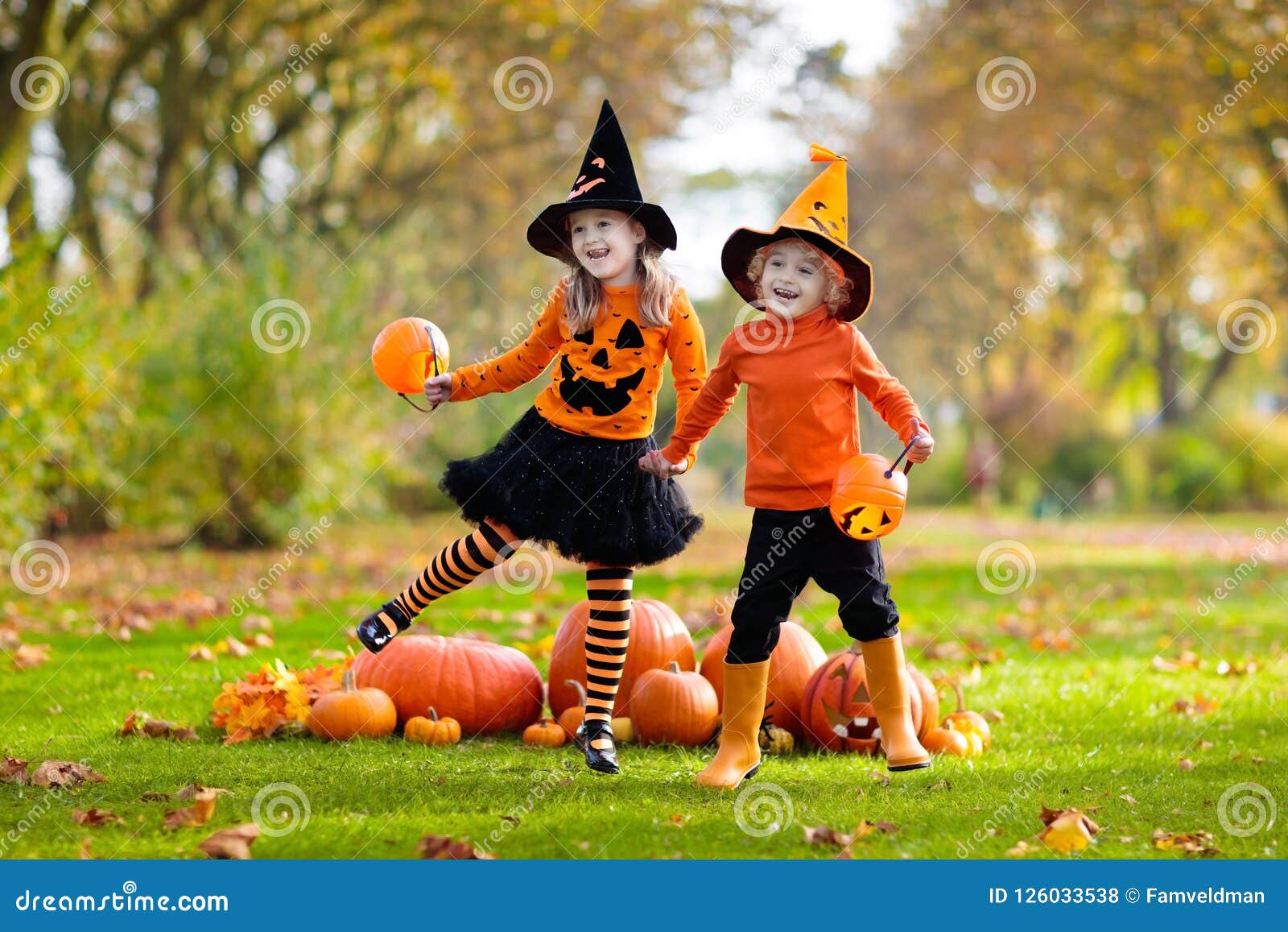 Kids with Pumpkins in Halloween Costumes Stock Photo - Image of jack ...