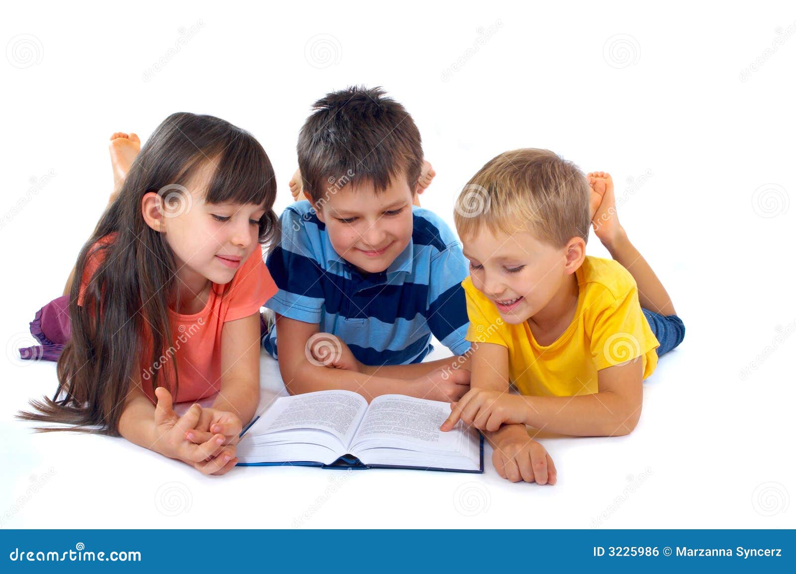 kids reading book together