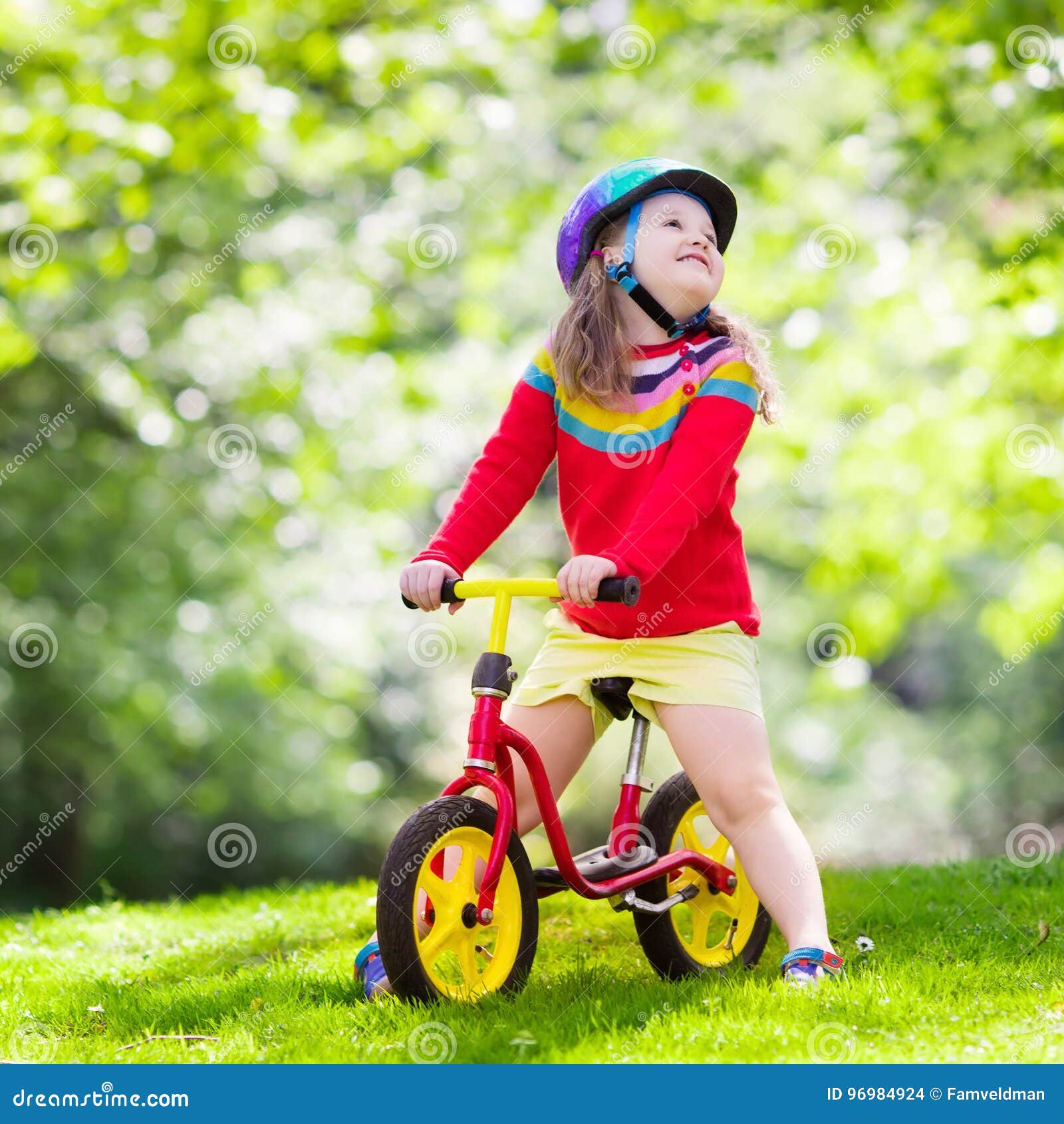 kids riding balance bikes