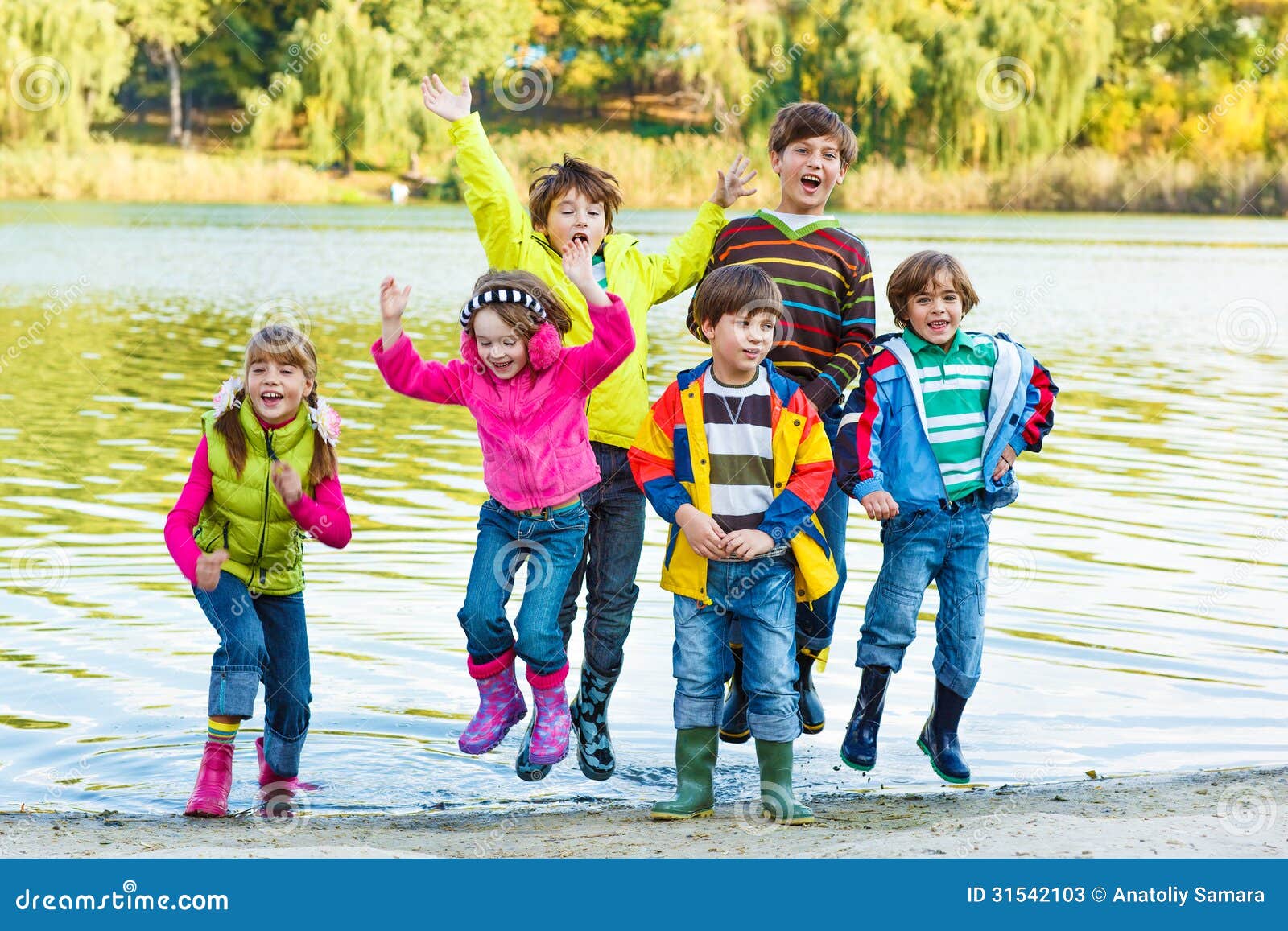 Kids in rubber boots stock image. Image of cheerful, happy 31542103
