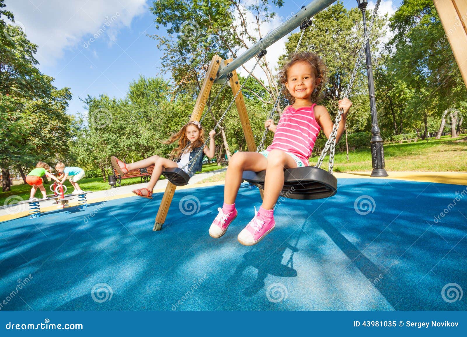 kids swing on playground