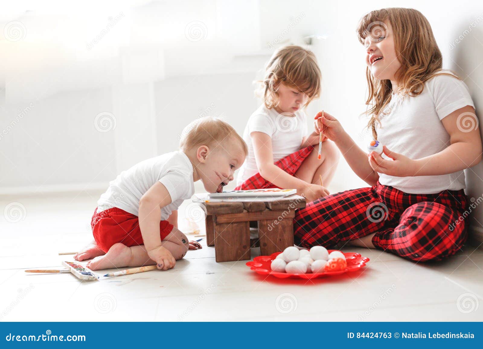 Kids Three Siblings Paint Eggs, Easter Stock Image - Image of decorating, coloring: 84424763