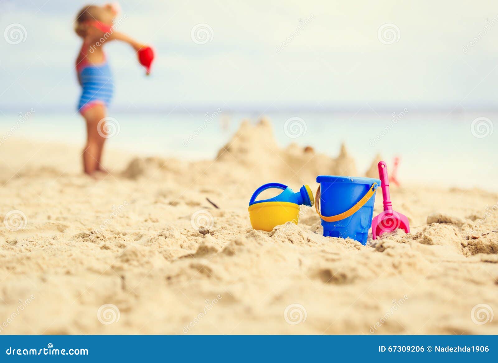 Kids Toys and Little Girl Building Sandcastle Stock Photo - Image of ...