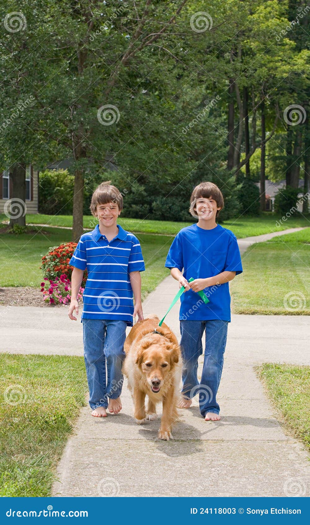 kids walking dog