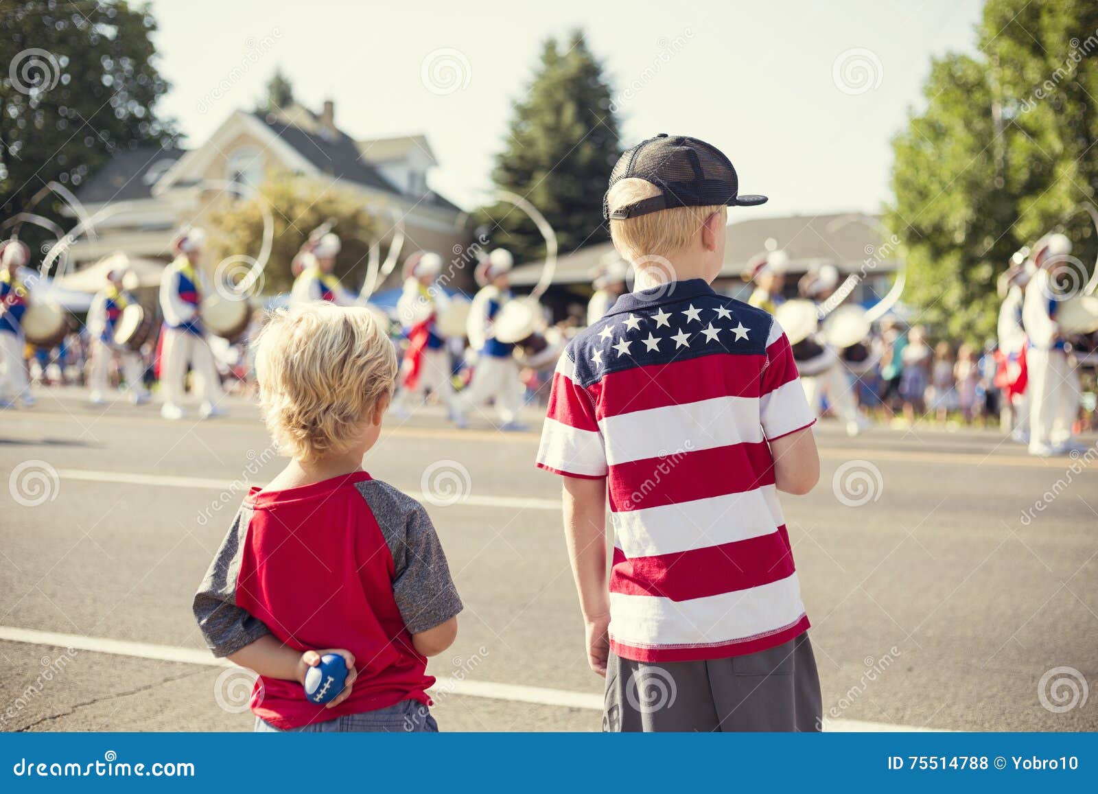 kids watching an independence day parade
