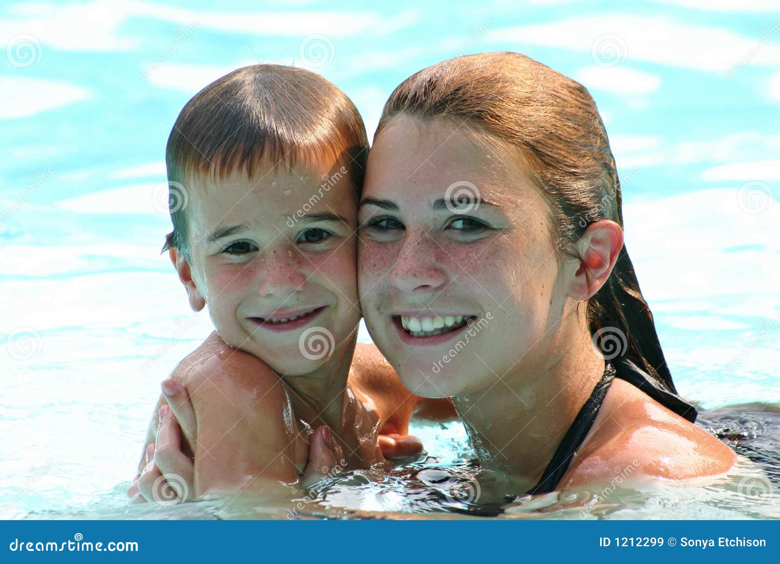 Kids in Water stock image. Image of close, female, grinning 1212299