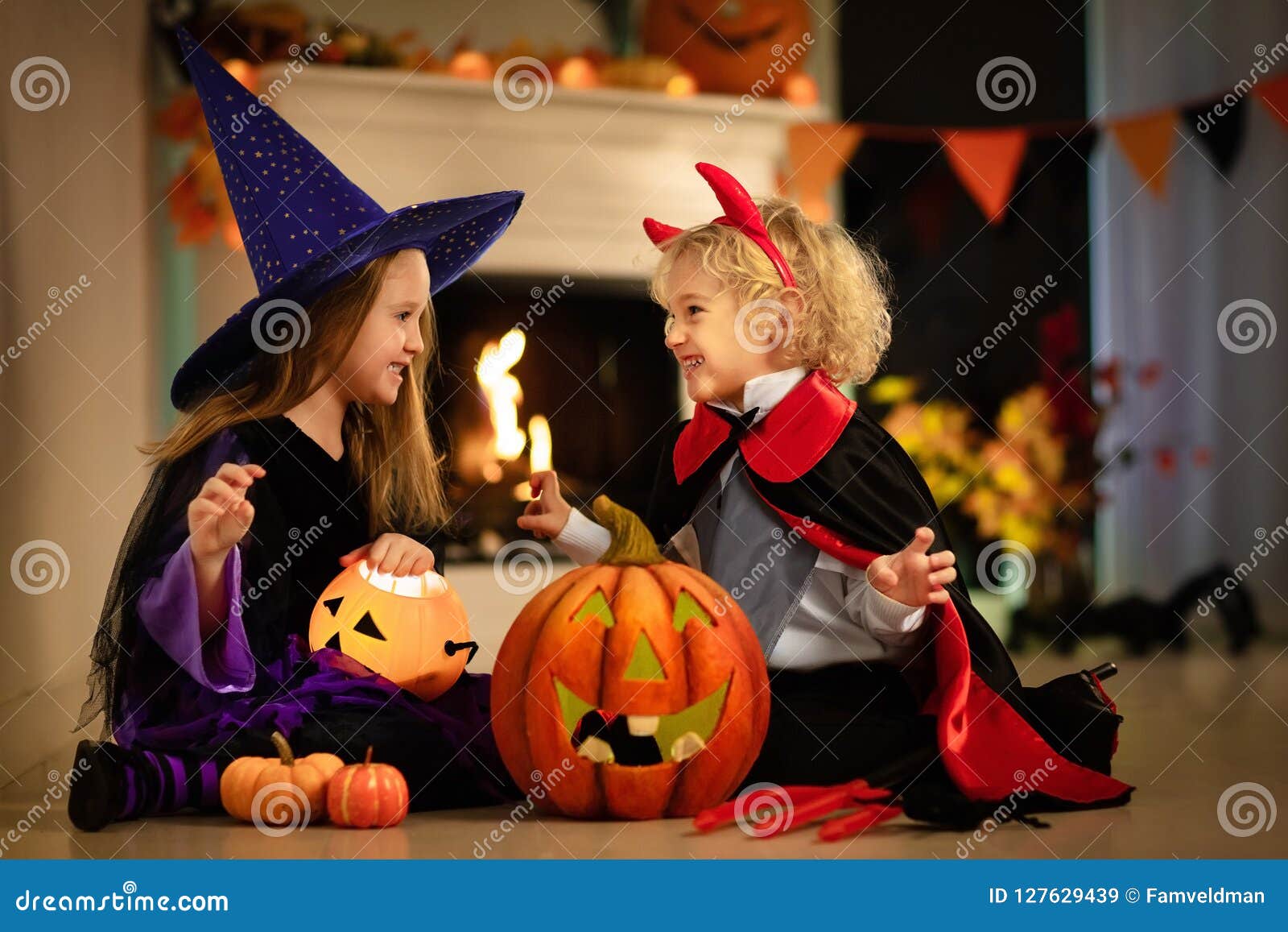 kids in witch costume on halloween trick or treat