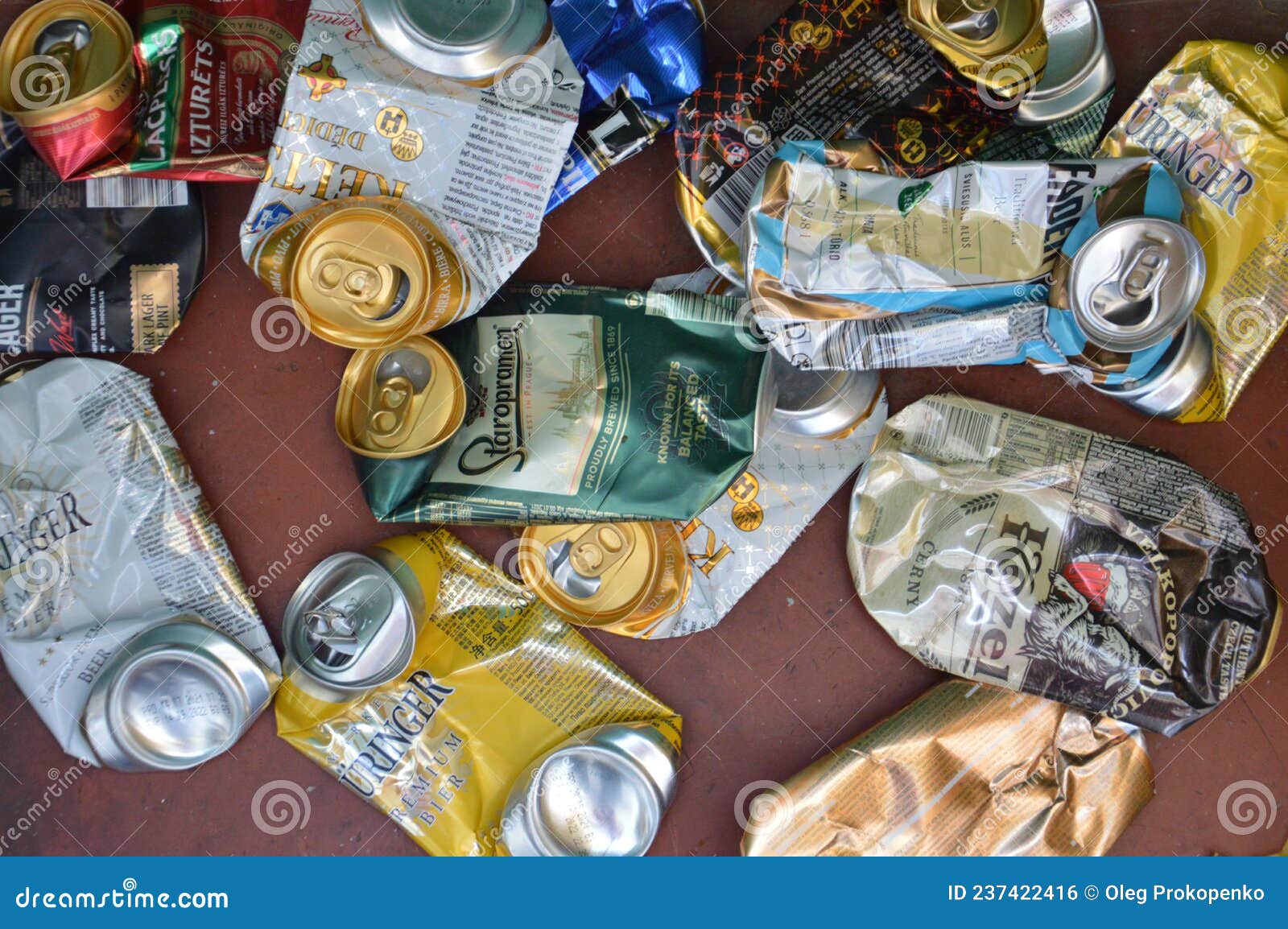 KIEV, UKRAINE DECEMBER 22, 2021 Crumpled Beer Cans for Scrap