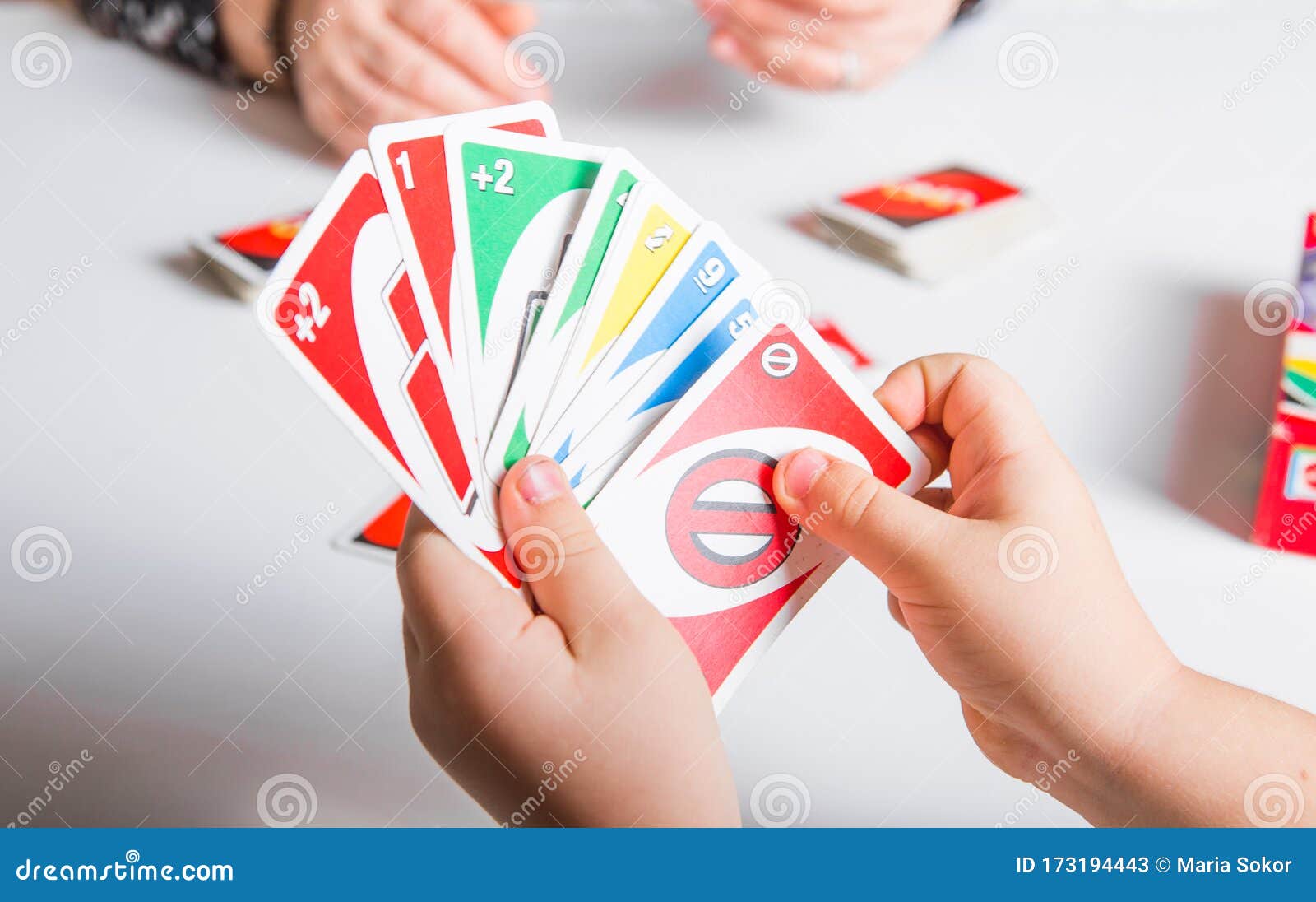 Kiev, Ukraine - Jeniaury 31th 2020 : Uno Cards In Hand Little Child Boy; American Card Game ...