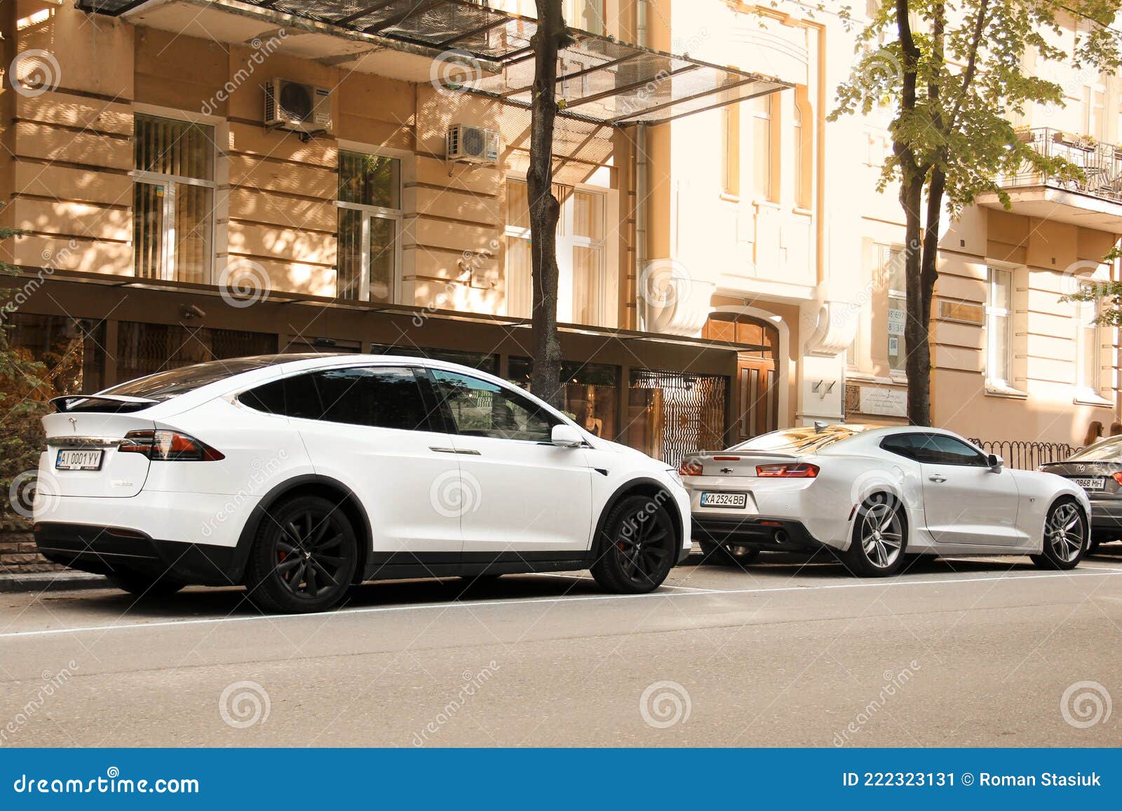 Kiev, Ukraine - May 22, 2021: White Electric Car Tesla Model X and Gray  American Muscle Car Chevrolet Camaro Parked in the City Editorial Photo -  Image of kiev, design: 222323131