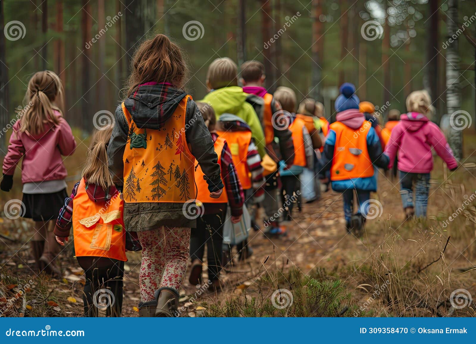 kindergarten in forest, children walking with tutors in wild park, finnish forest school, forest kindergarten