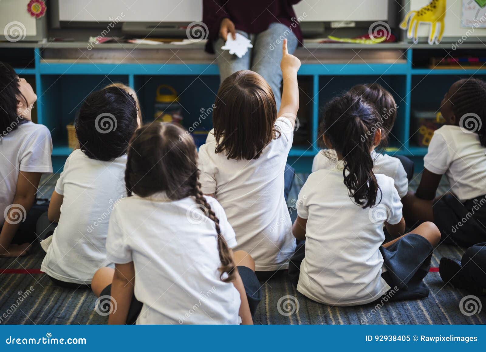 Kindergarten Students Sitting On The Floor Stock Image Image Of