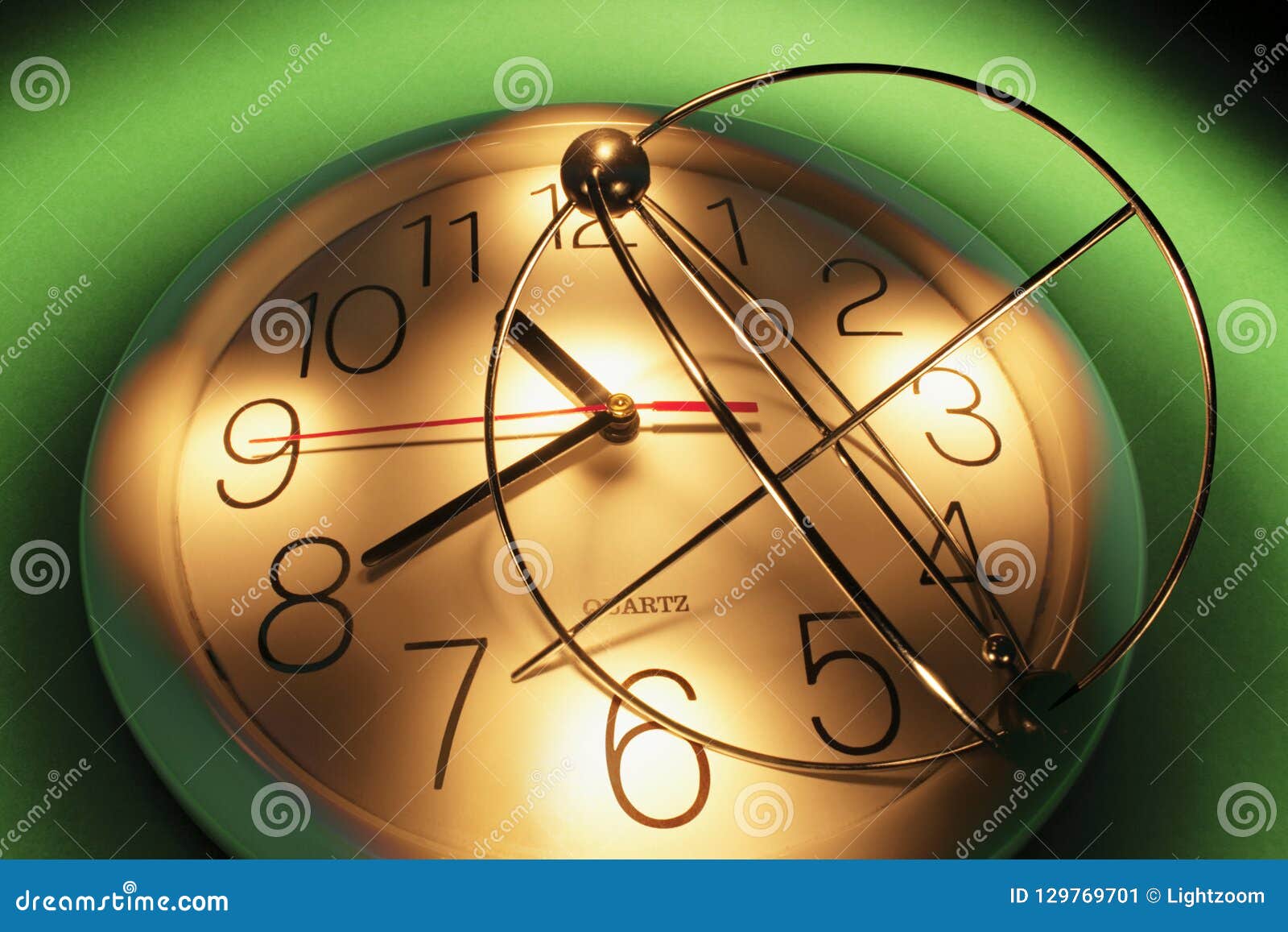 Mobile and Clock stock image. Image of ornament 129769701
