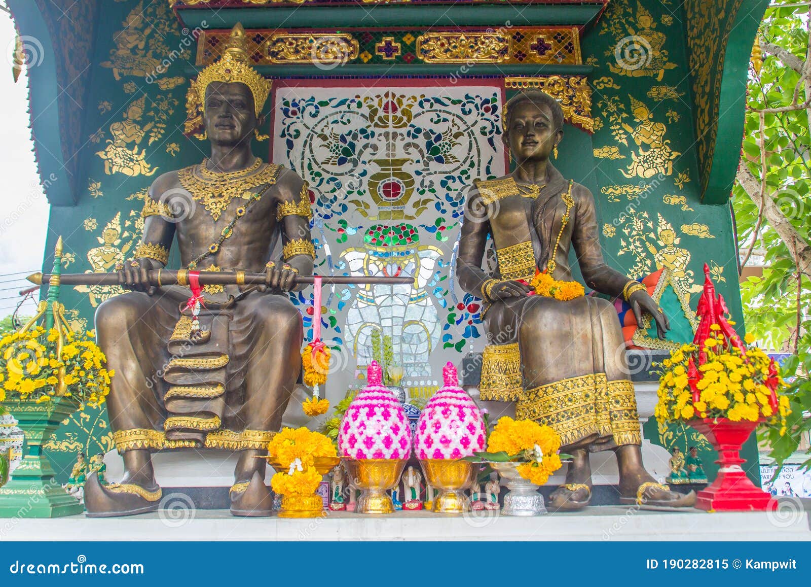 king mangrai and his queen statues at wat ming muang buddhist temple, chiang rai, thailand. king mangrai, also known as mengrai.