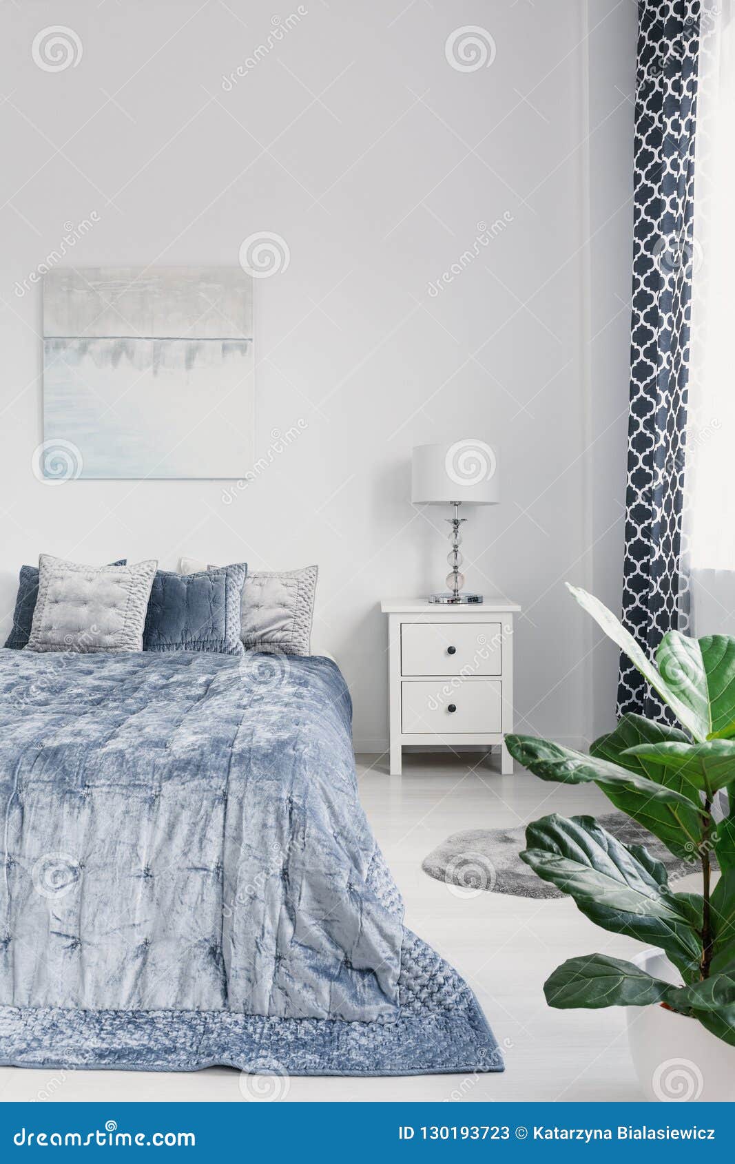 King Size Bed With Elegant Blue Bedding White Nightstand 