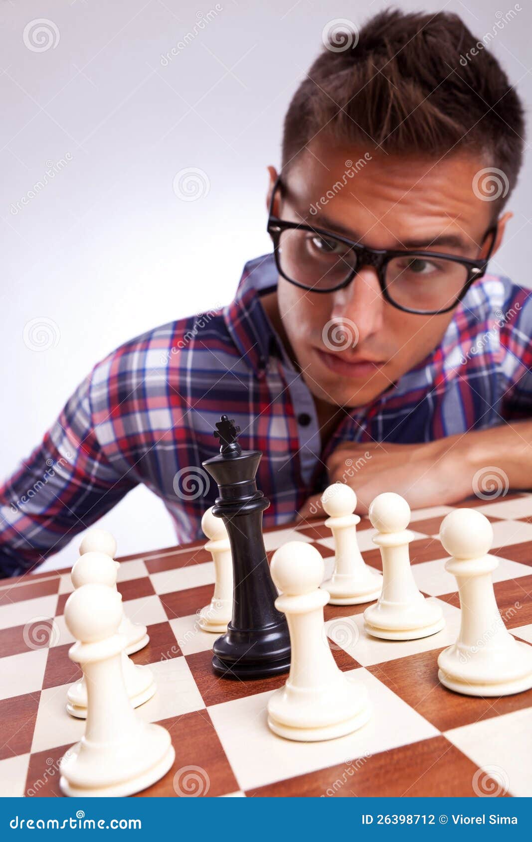 King surrounded by pawns stock photo. Image of fight 26398712