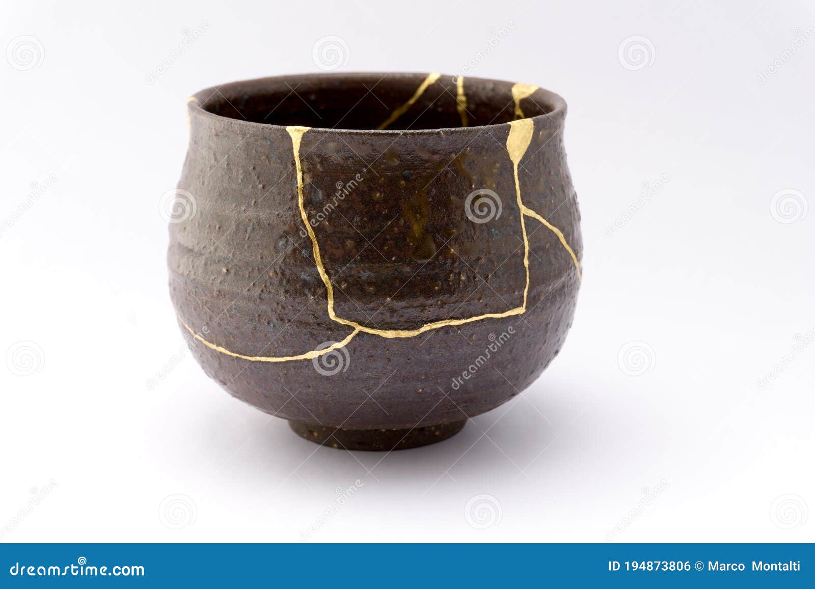 Kintsugi Blue Bowl Repaired With Gold Stock Photo - Download Image