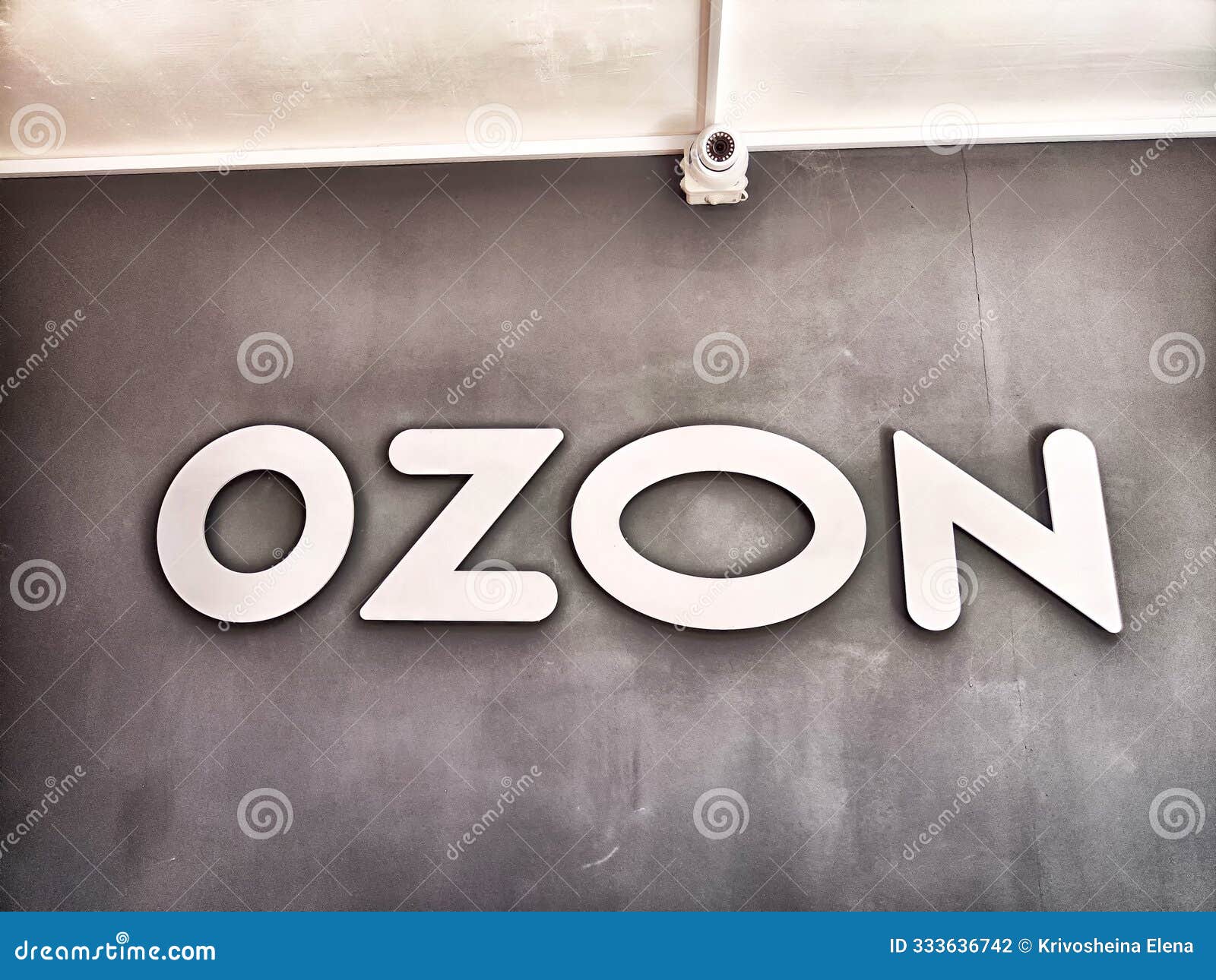 kirov, russia - july 23, 2024: the company name ozon is showcased in bold, modern letters against a dark wall