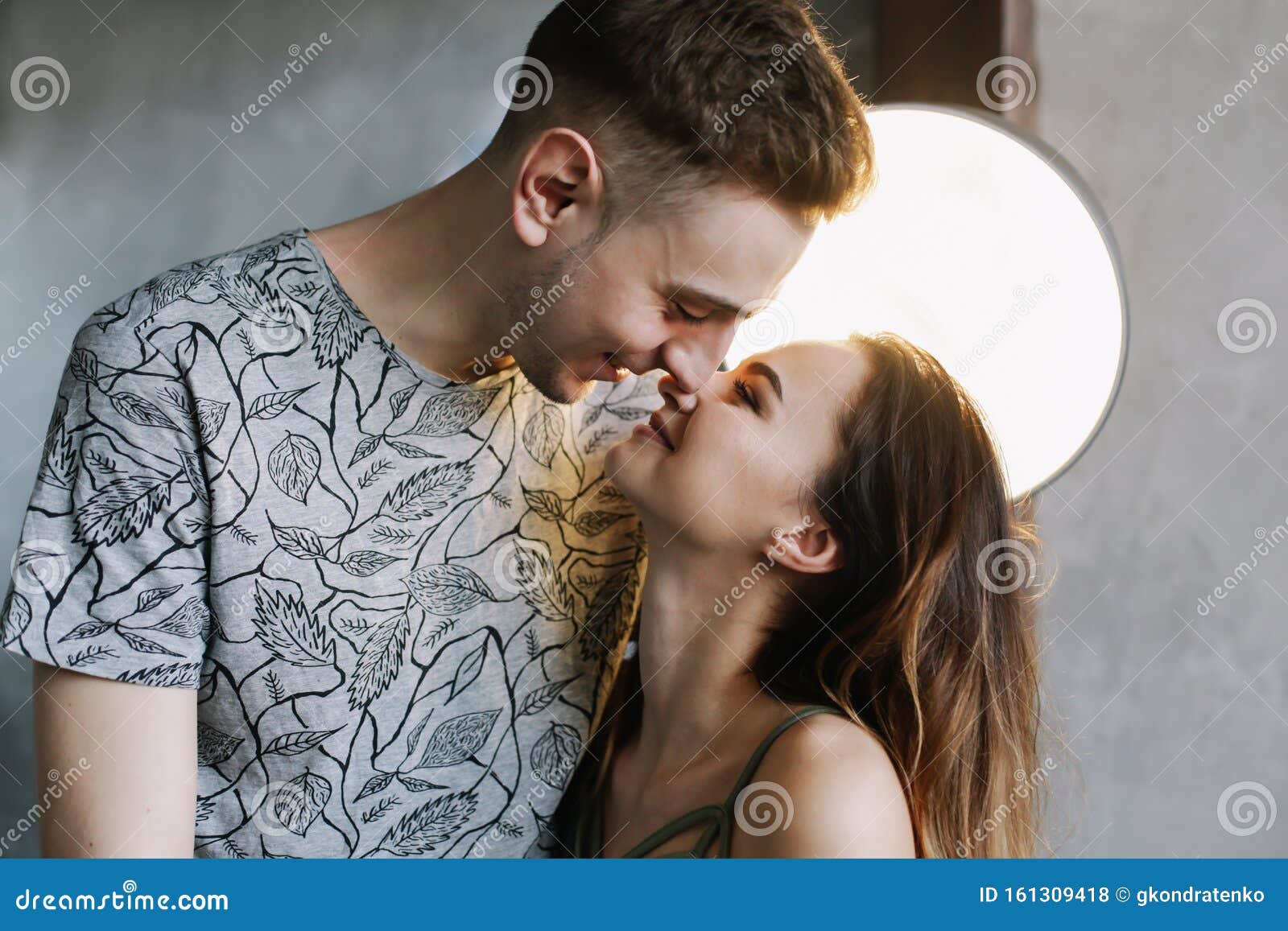 Kissing Couple Portrait. Young Couple Deeply in Love Sharing a ...