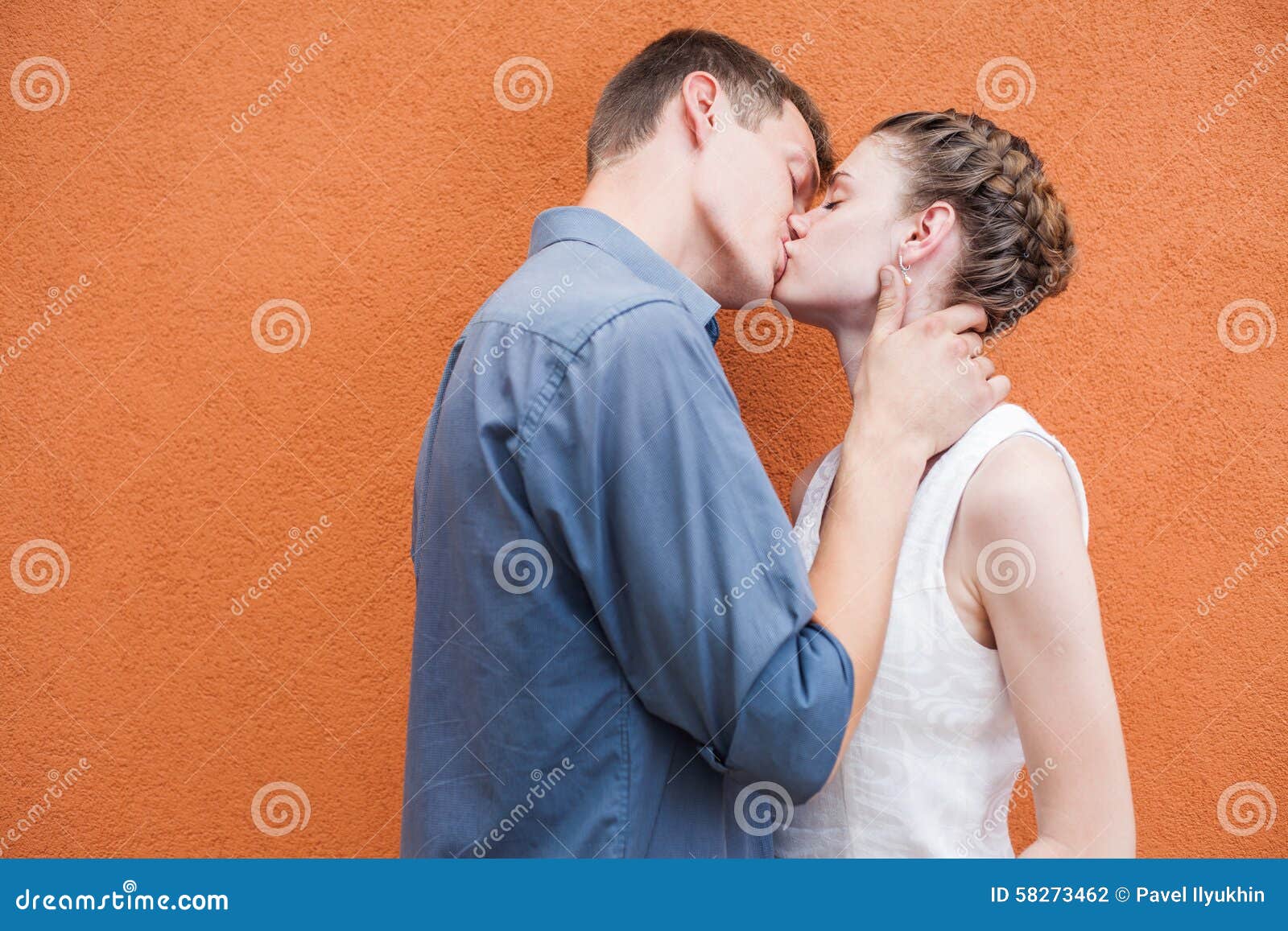Kissing Couple at Red Wall Background Stock Photo - Image of caucasian,  concept: 58273462