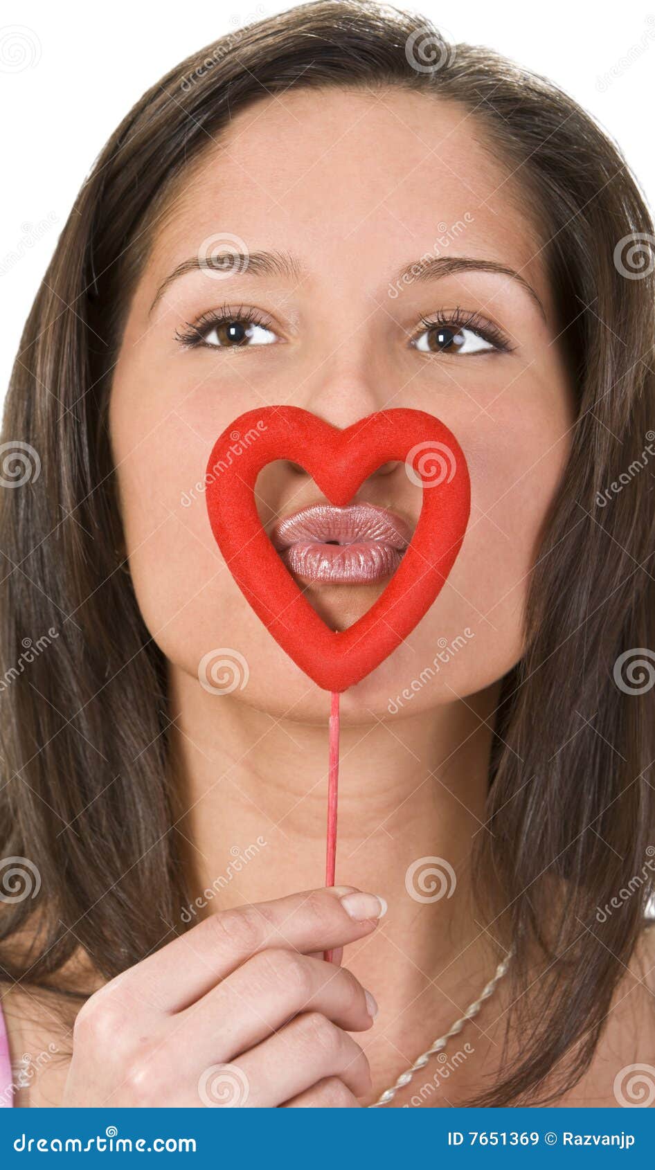 Kissing through a heart stock image. Image of attractive 7651369