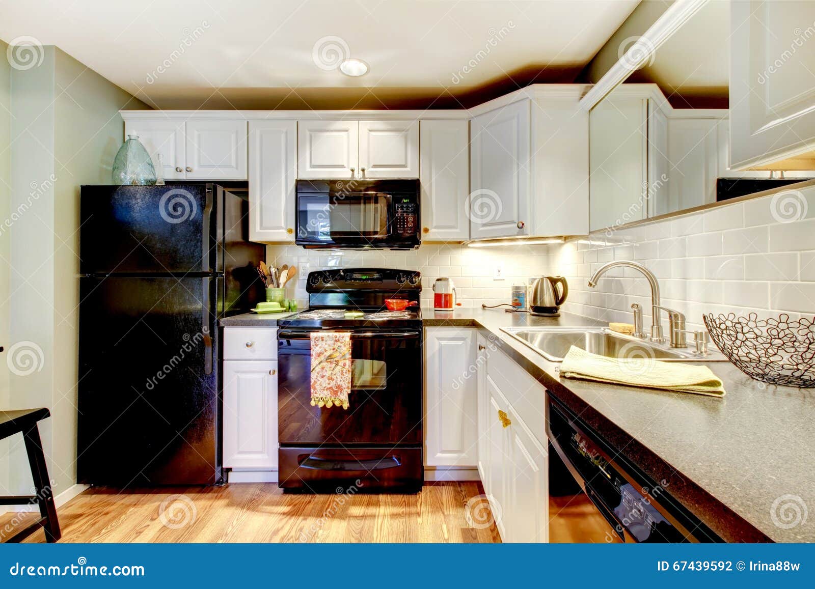 Bright kitchen interior with modern white furniture, pastel mint fridge  Stock Photo by bialasiewicz