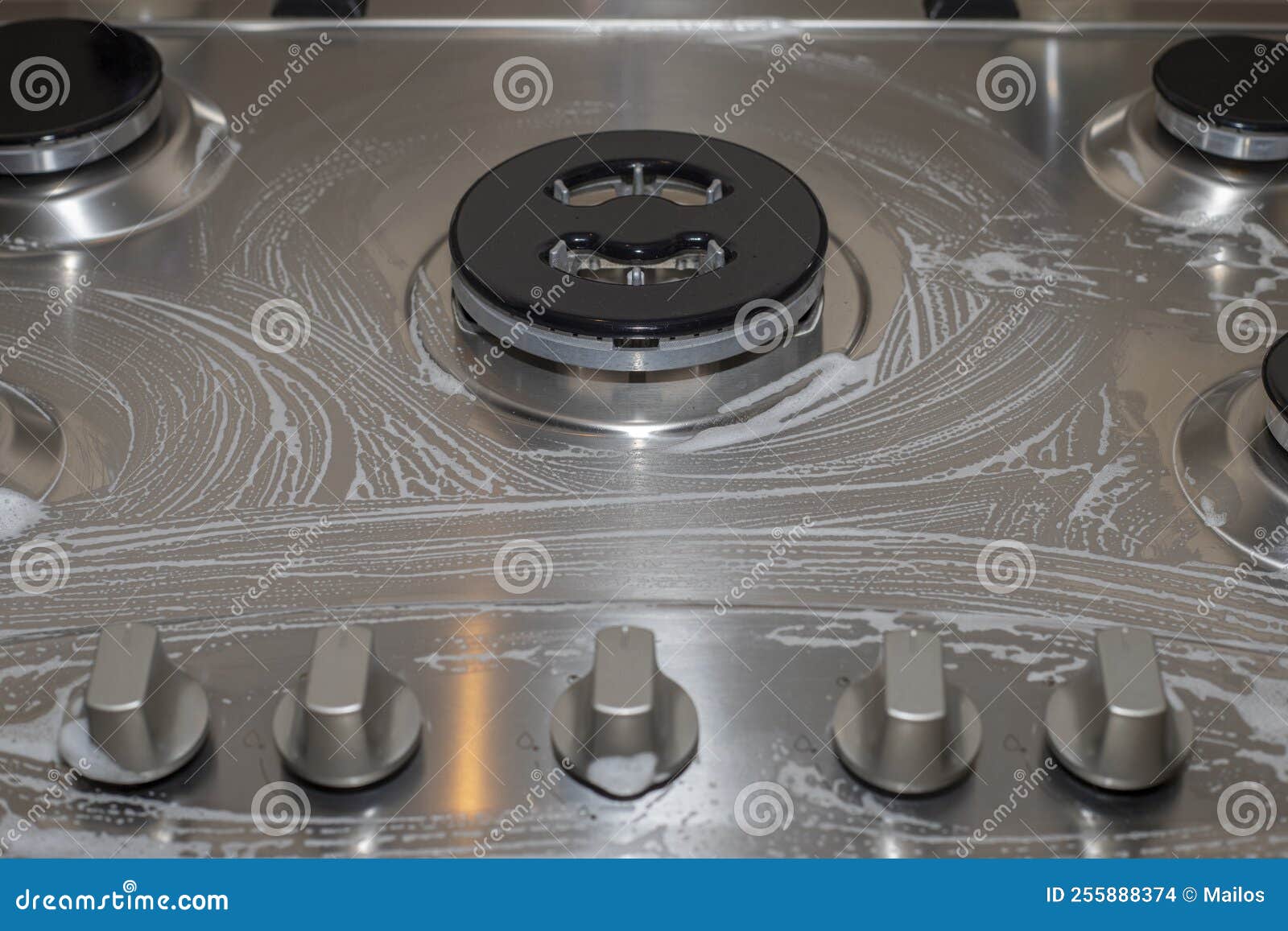 Kitchen Cleaner Foam on the Burner Surface of Stove Stock Photo Image