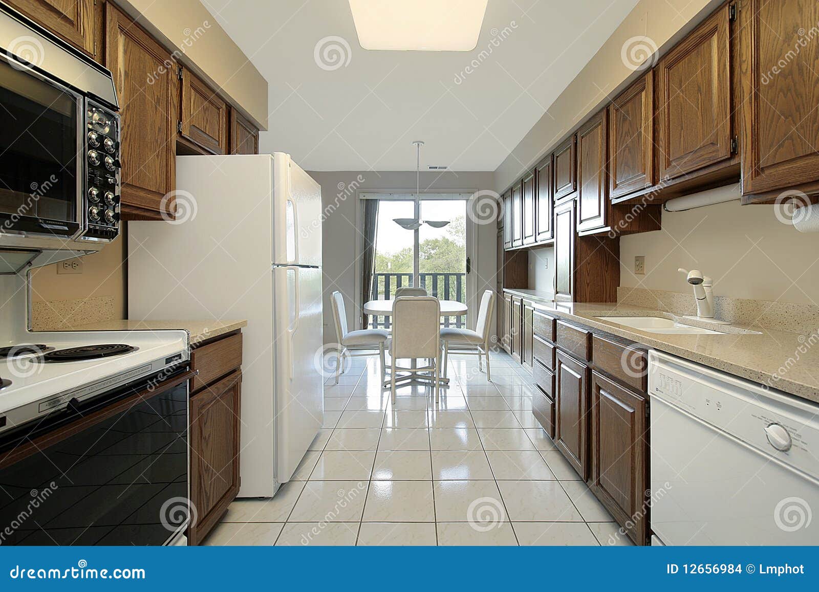 Kitchen in condo stock photo. Image of interior, appliance 12656984