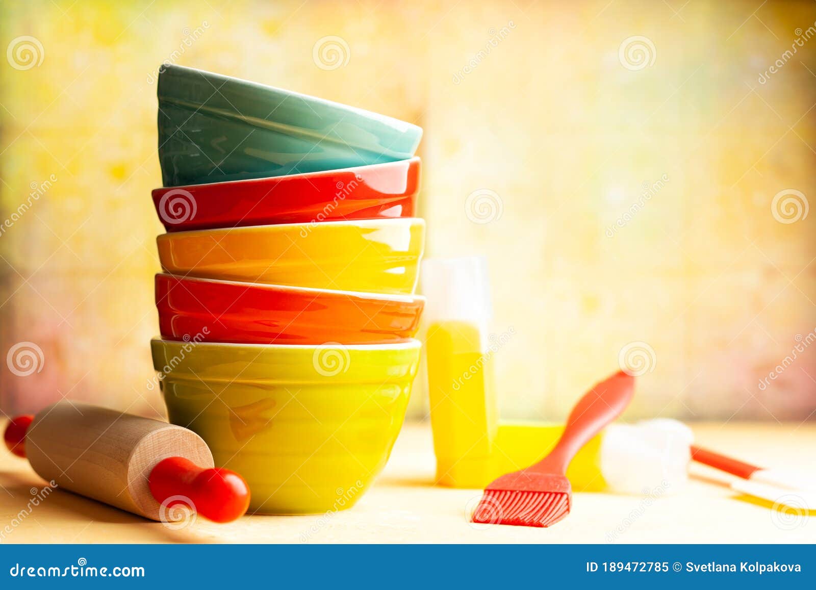 Kitchen Cooking Utensils Background with Ceramic Multi Colored Bowls