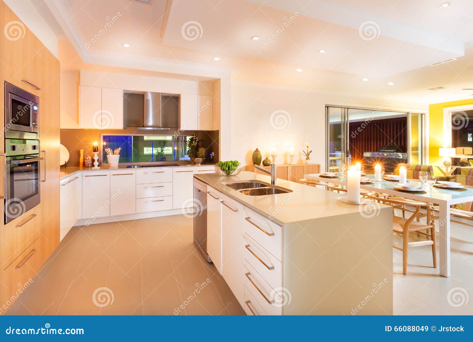 Kitchen and Dining Area Illuminated by Ceiling Lights and Flashing