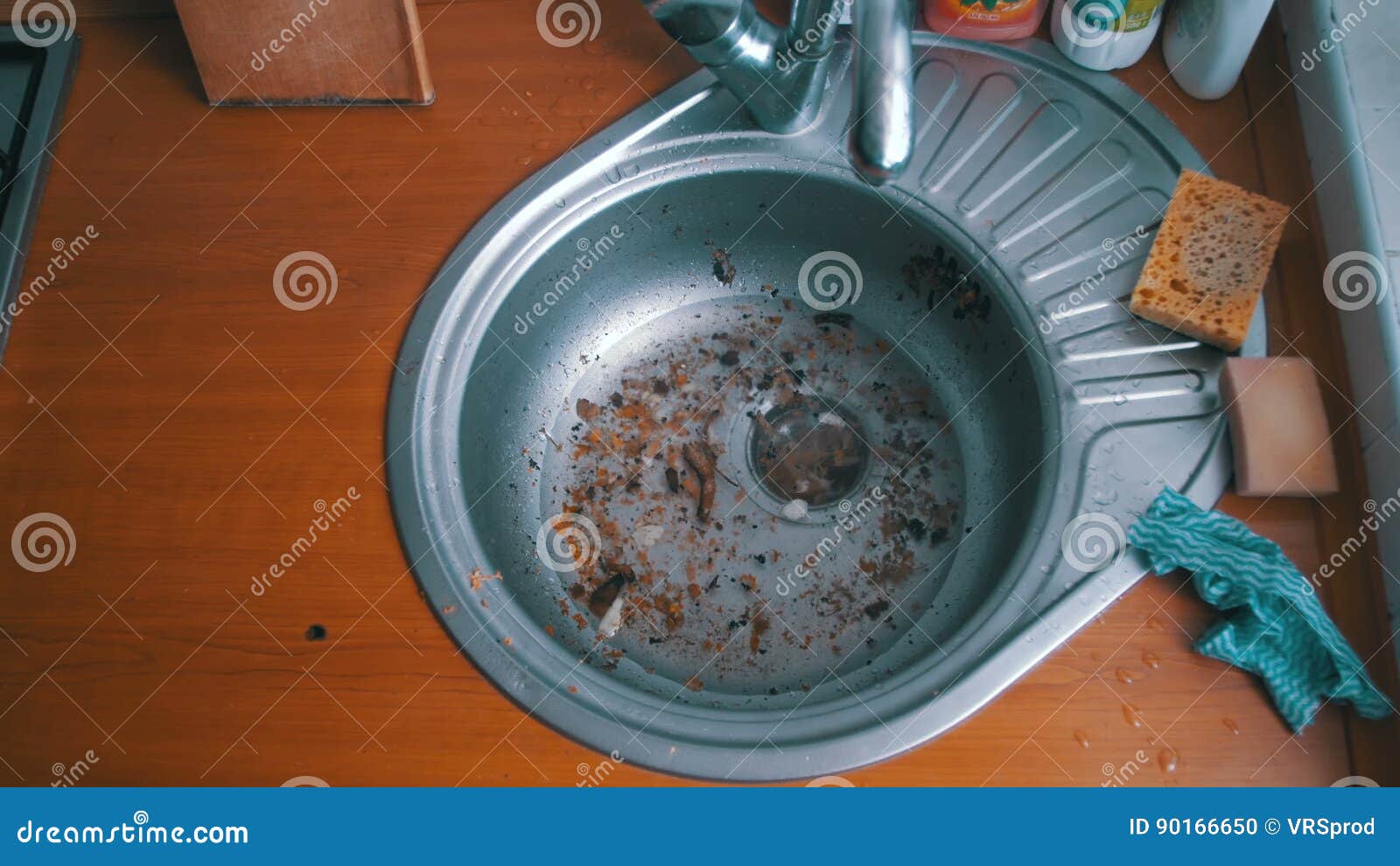 Kitchen Drain Clogging Up With Food Particles Stock Footage