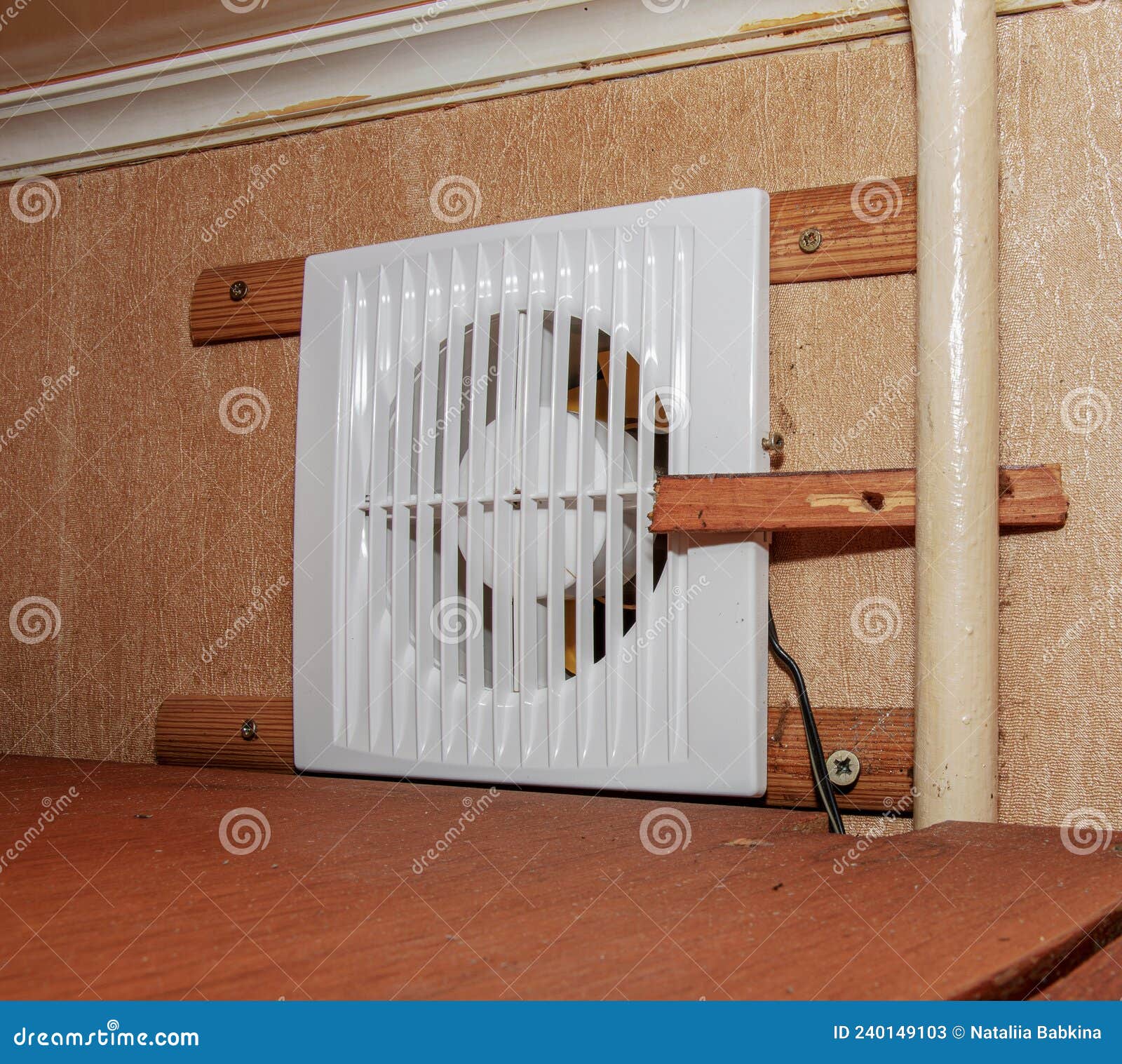 The Kitchen Exhaust Fan after Cleaning and Washing is Installed on the