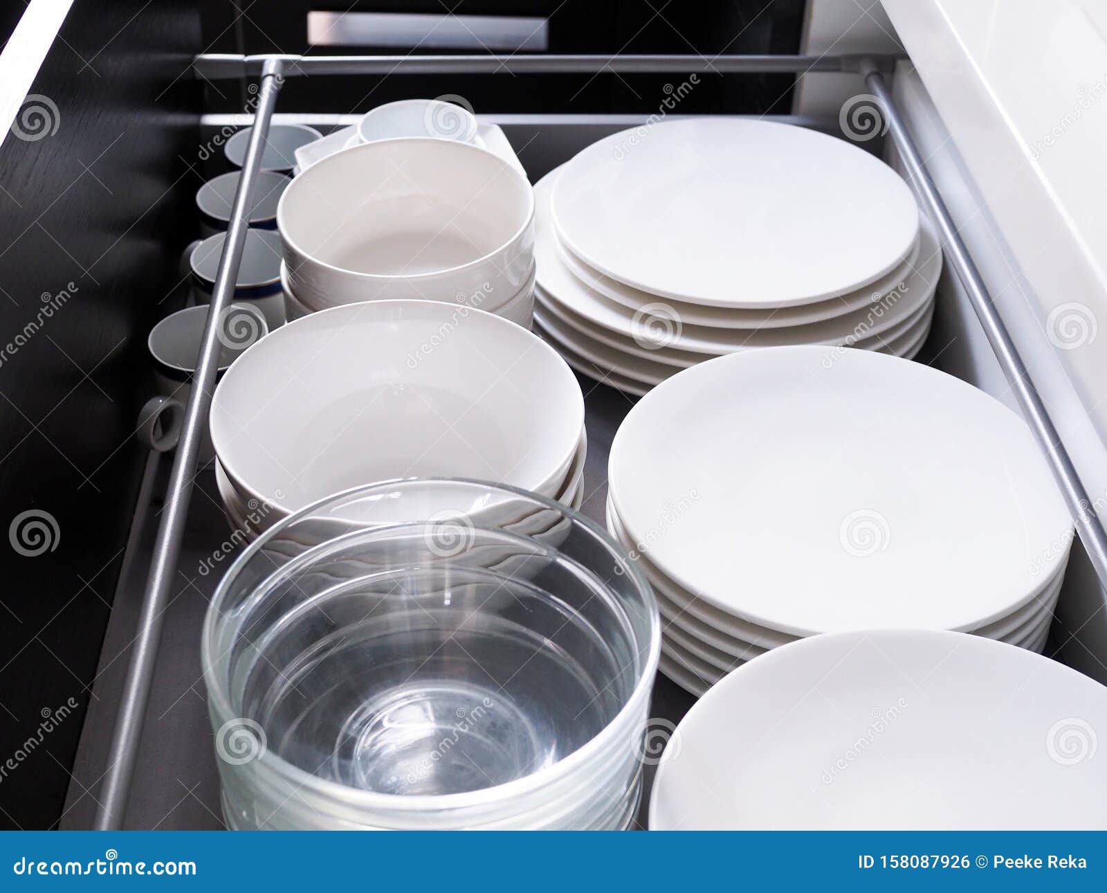 Kitchen Furniture With Plates Stored In Drawers Counter Cabinet