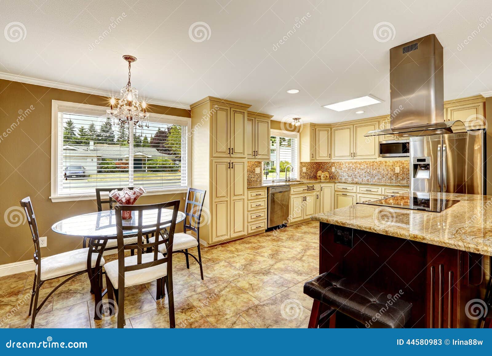 Kitchen Interior With Dining Table Set And Island Stock Image