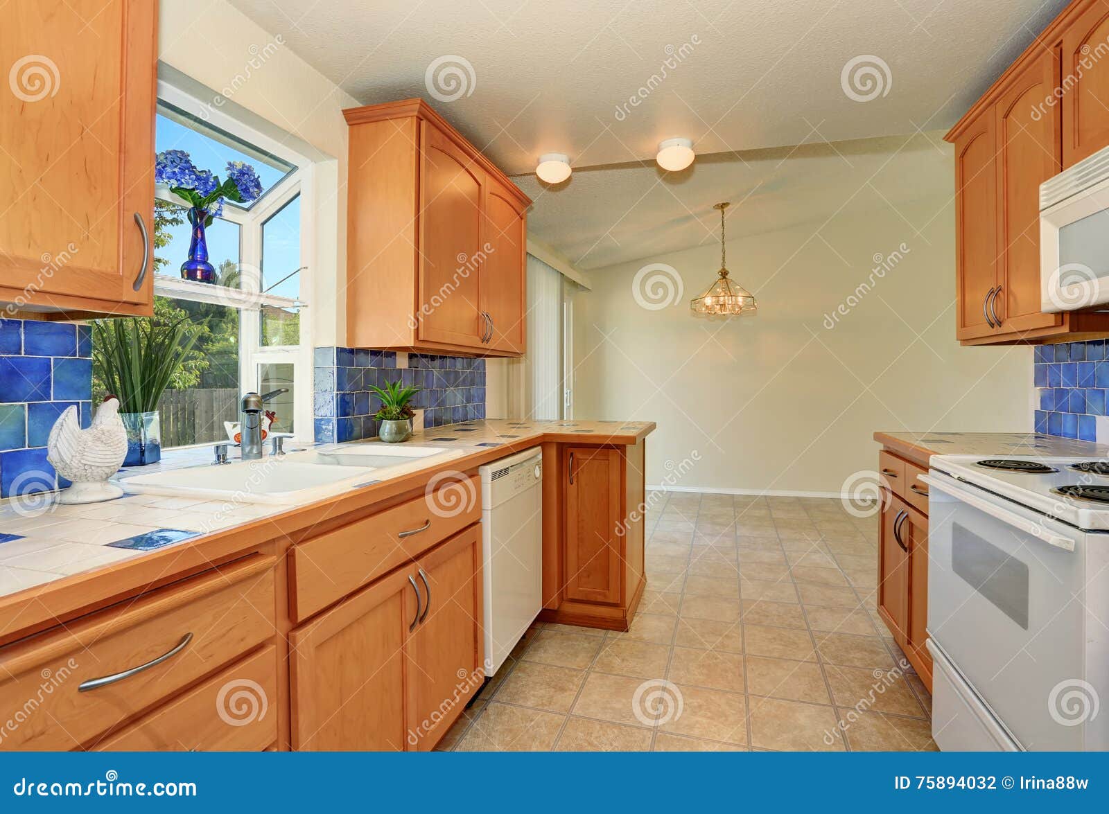 Kitchen Interior Maple Cabinets And Back Splash Trim Stock Photo