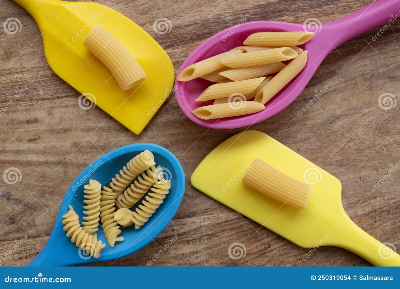 Kitchen Ladles with a Variety of Pasta on Top Stock Photo Image of