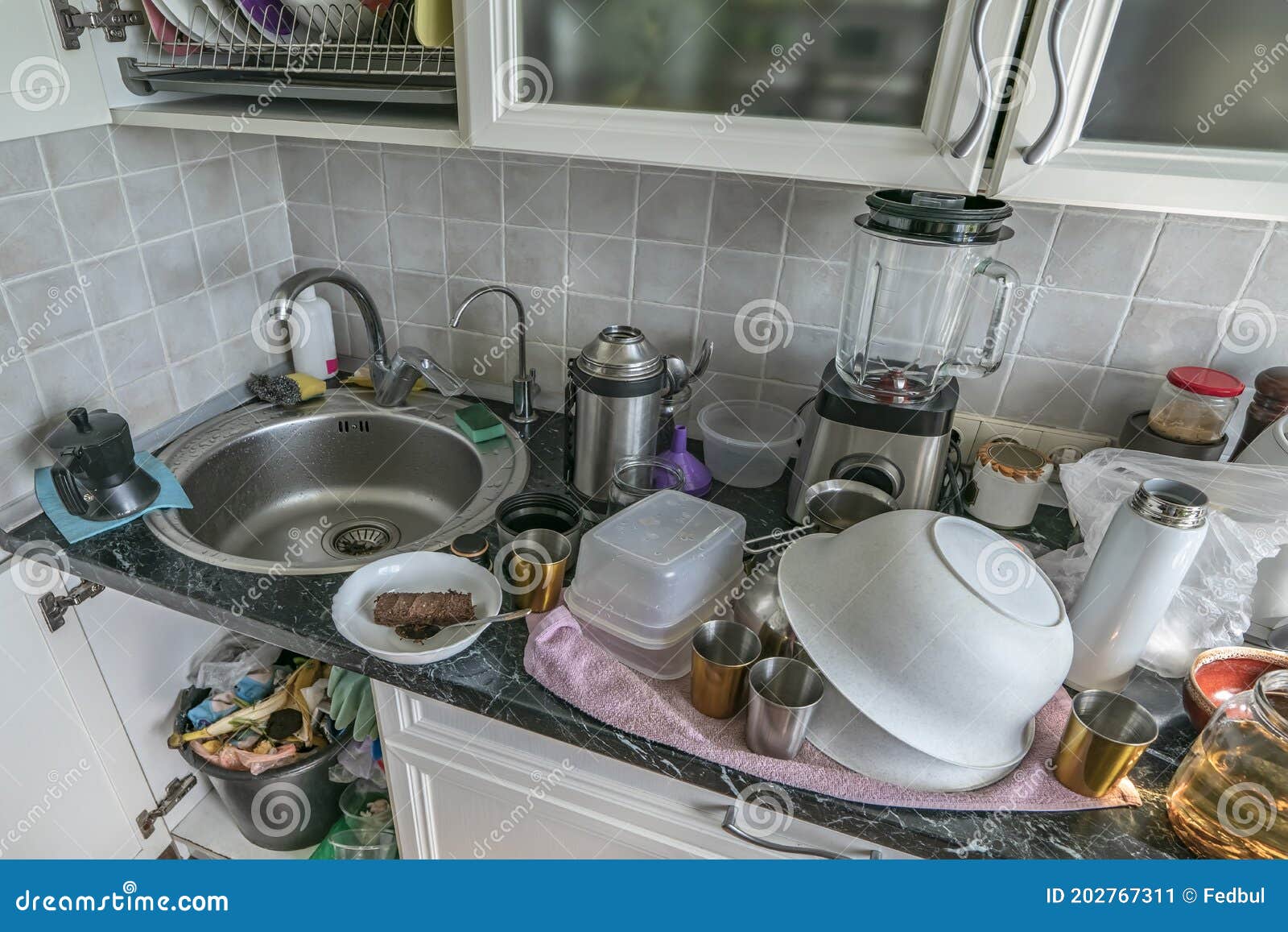 Pile of unwashed, dirty dishes in the sink. Mess in the kitchen. Dirty  kitchenware, plates and mugs. Chaos at home. Laziness. Cluttered apartment.  Messy cutlery and dishware. 15183924 Stock Photo at Vecteezy