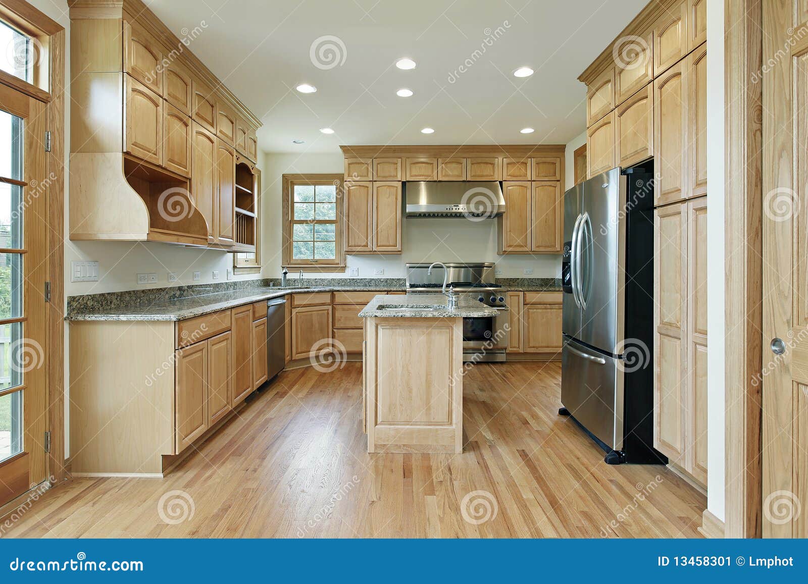 Kitchen With Oak Wood Cabinetry Stock Image - Image of 