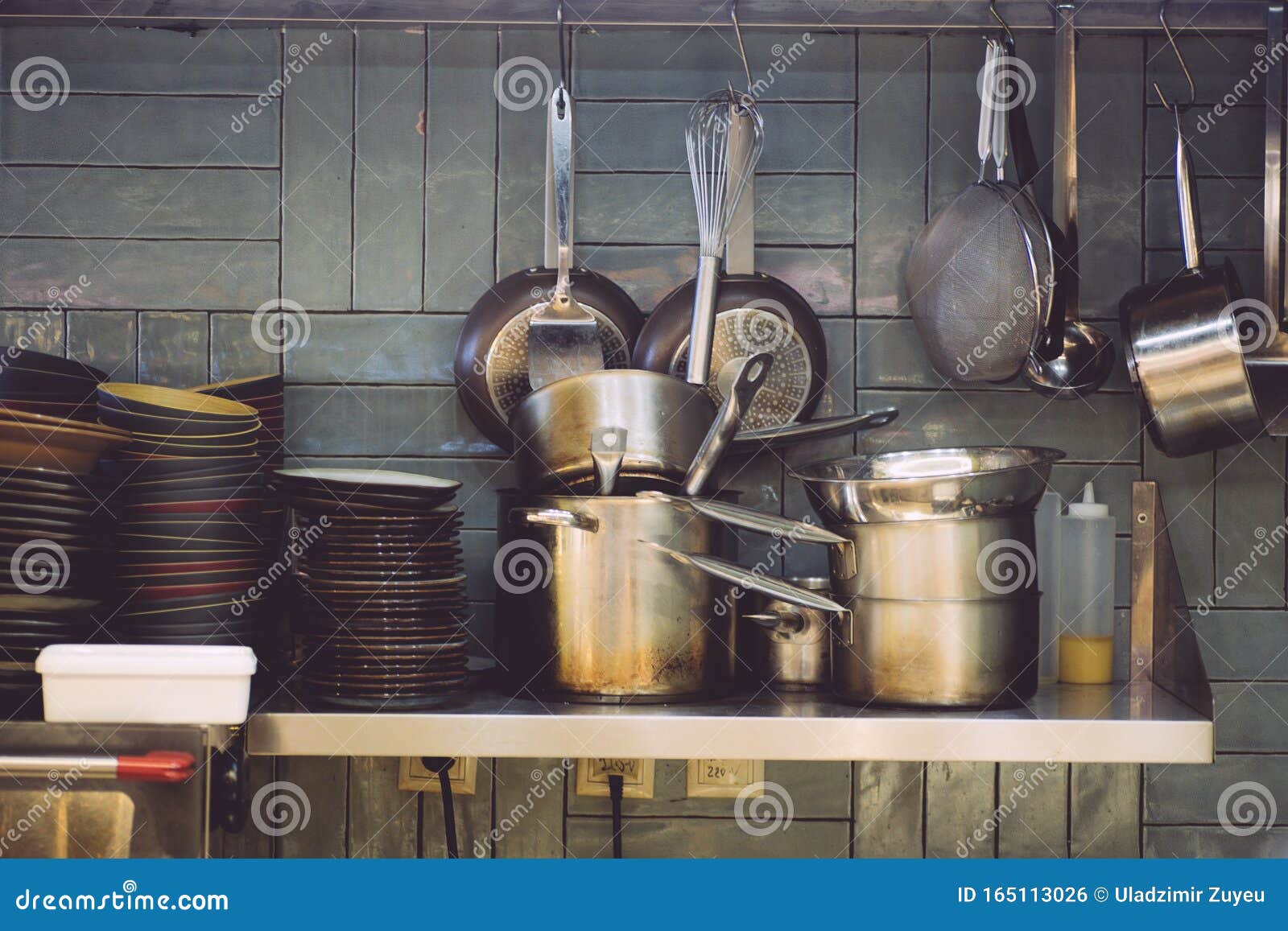Kitchen of the Restaurant. Iron Cookware in a Restaurant Pots, Stewpan